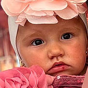 Djensy participe au concours pour gagner de l'argent avec cette photo : baby, child, face, headband, flower, pink, clothing, hand, portrait, cute, closeup, skin, eyebrows, lips, earrings, fabric, soft, person, infant, adorable