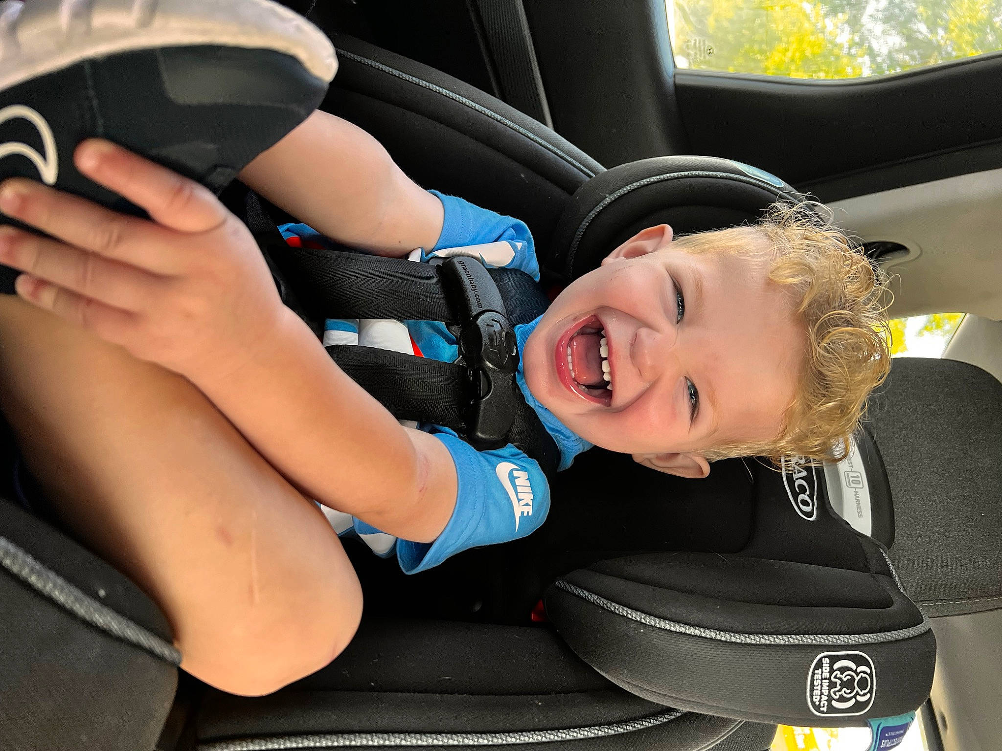 Grayson joined the competition — help win amazing prizes! auto_part, automotive_design, automotive_exterior, car, car_seat, car_seat_cover, child, comfort, electric_blue, family_car, luxury_vehicle, motor_vehicle, person, personal_protective_equipment, product, smile, steering_wheel, toddler, vehicle, vehicle_door