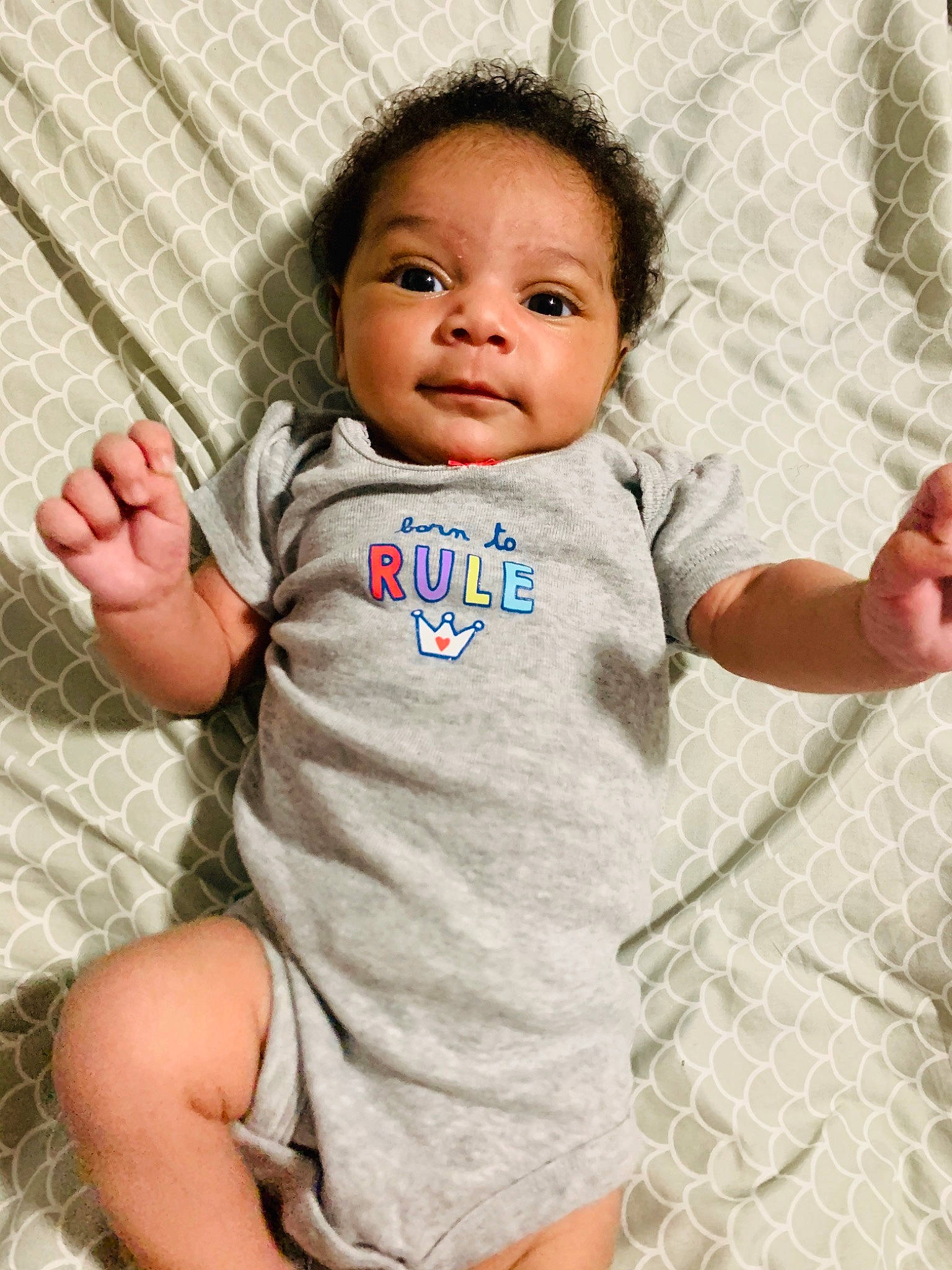 Amyra is registered to the contest to win money with this photo: baby, baby_toddler_clothing, cheek, child, finger, gesture, person, skin, smile, thumb, toddler