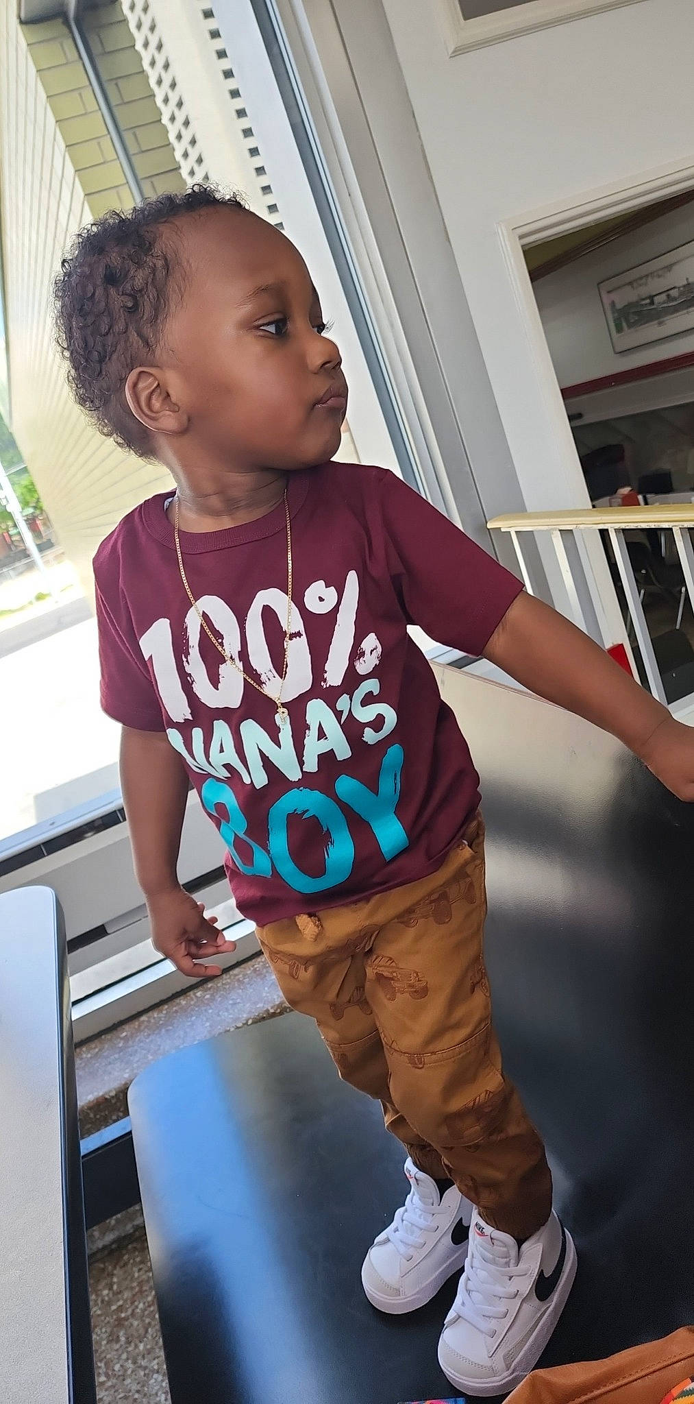 Jacoby is registered to the contest to win money with this photo: arm, child, cool, electric_blue, eyewear, fun, happy, joint, leisure, logo, muscle, person, selfie, shoulder, sitting, sleeve, sportswear, standing, t_shirt, toddler