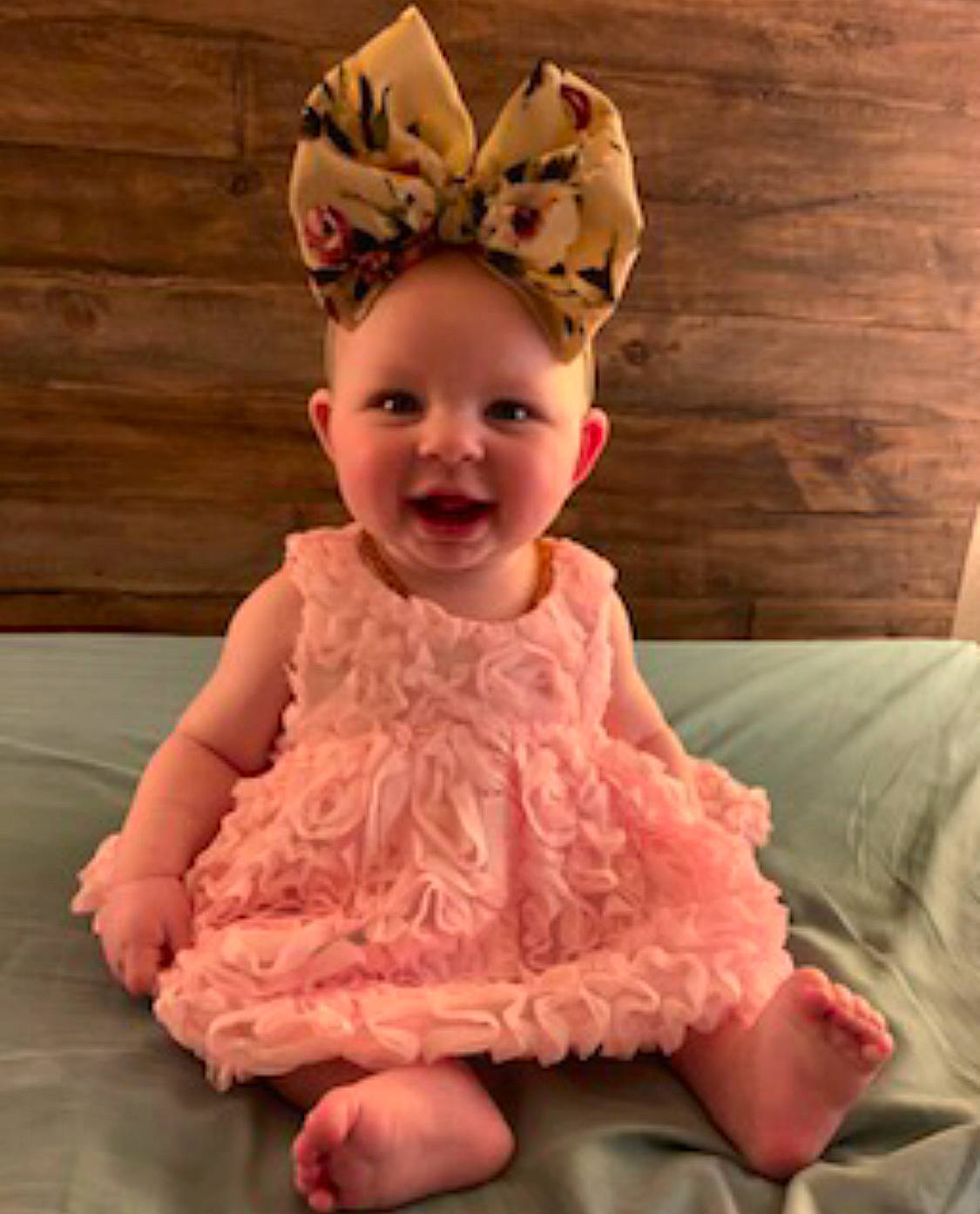 Dawsyn joined the competition — help win amazing prizes! baby, child, child_model, clothing, costume, dress, ear, fashion_accessory, hair_accessory, head, headband, headgear, headpiece, peach, person, pink, sitting, smile, toddler
