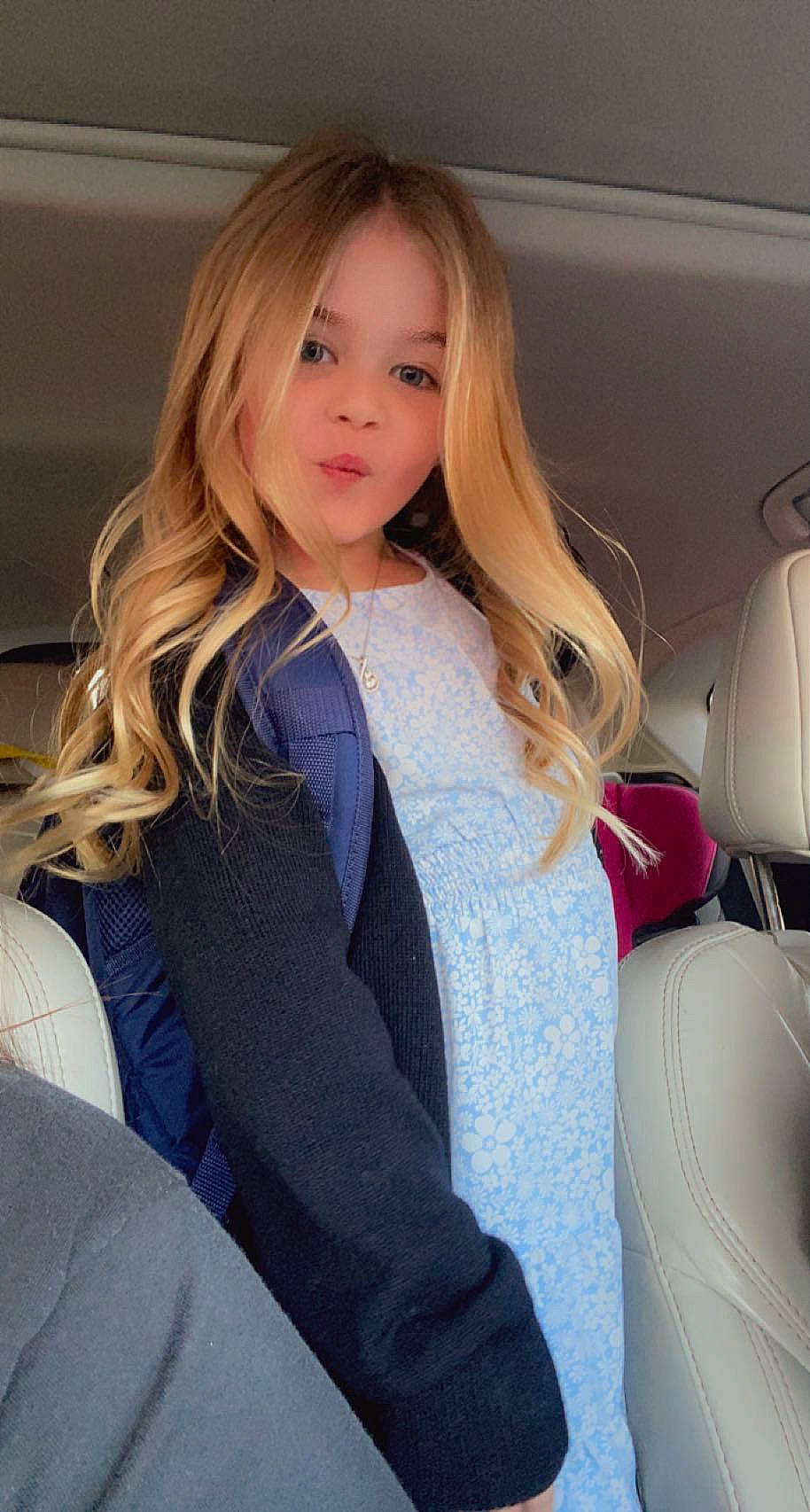 Talyn is registered to the contest to win money with this photo: automotive_design, blazer, blond, collar, electric_blue, fashion_design, formal_wear, hair, hairstyle, human_leg, jewellery, layered_hair, lip, long_hair, neck, person, shoulder, skin, sleeve, thigh