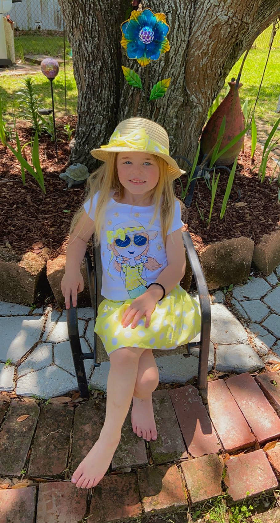 Talyn joined the competition — help win amazing prizes! botany, eye, fun, grass, green, happy, hat, headwear, human_leg, joy, leaf, leisure, people_in_nature, person, plant, recreation, sandal, shade, smile, summer