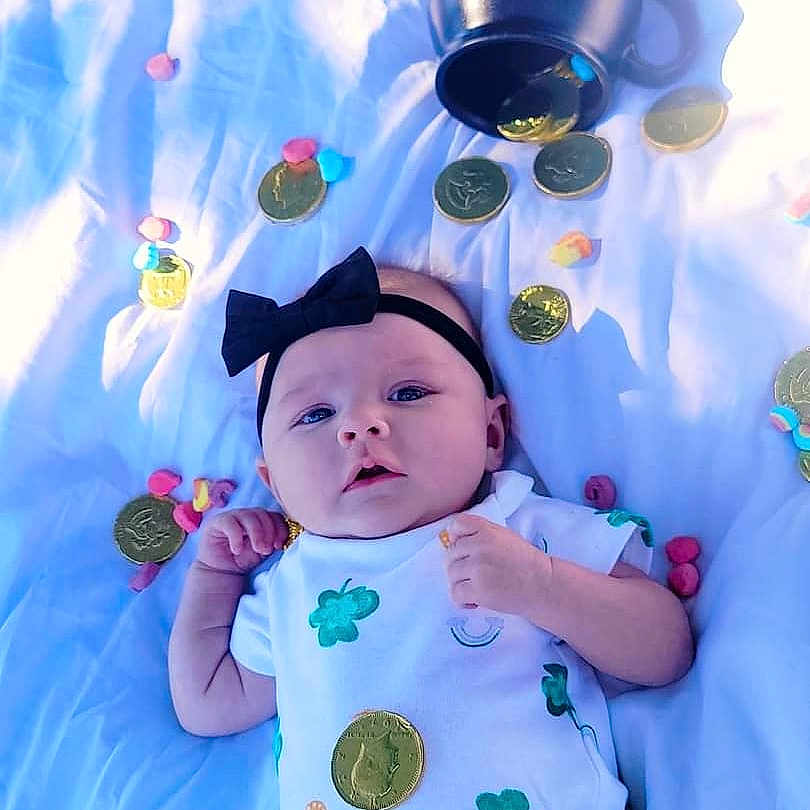 Ariah joined the competition — help win amazing prizes! baby, bed, blanket, bodypart, clothing, crib, face, finger, furniture, hand, hat, head, infantbed, newborn, people, person, photography, portrait, sleeve, t_shirt