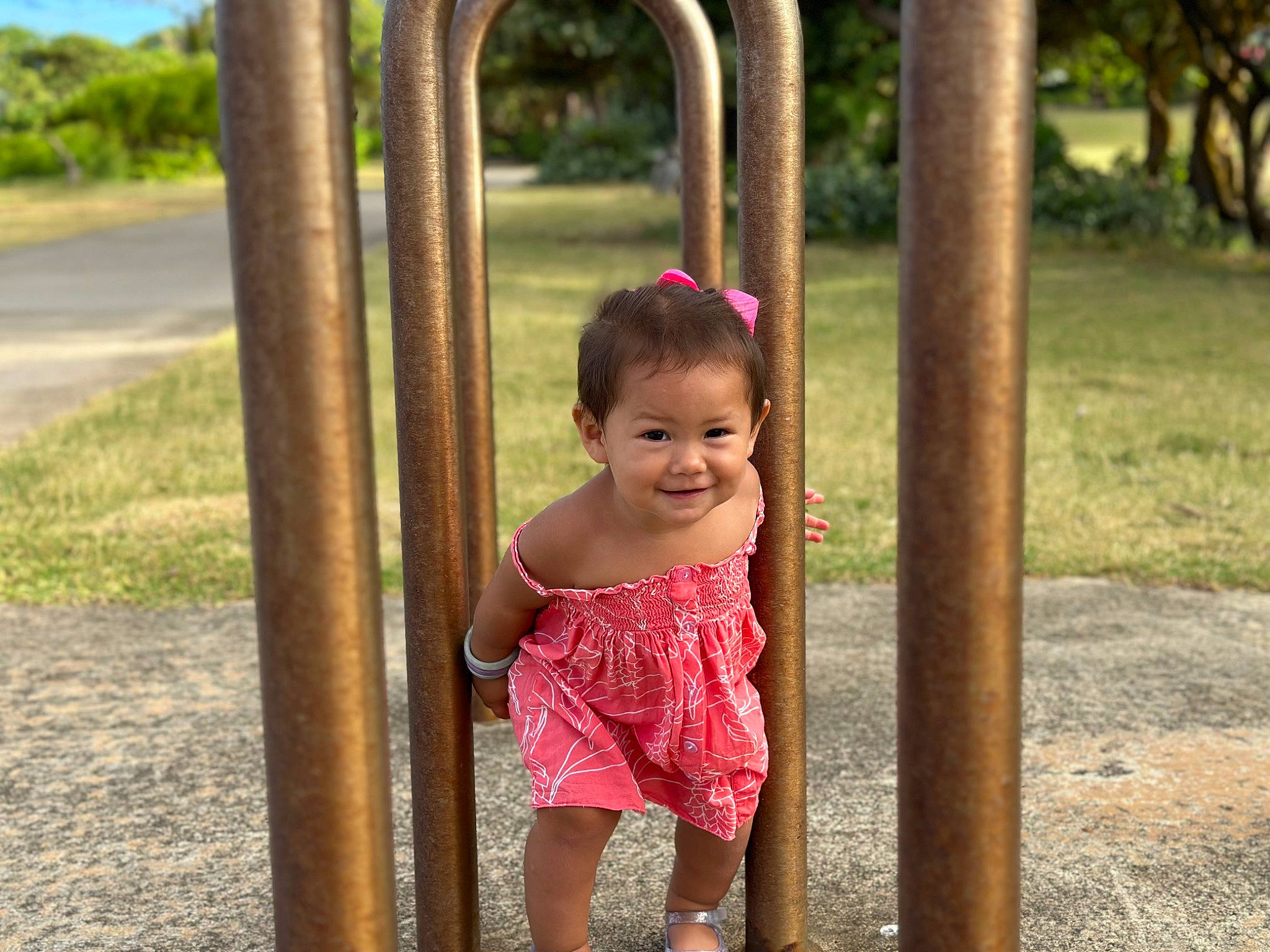 Kailia is registered to the contest to win money with this photo: baby, baby_toddler_clothing, beauty, child, chin, eye, face, fun, grass, hair, happy, head, joy, leisure, magenta, person, pink, recreation, shorts, smile