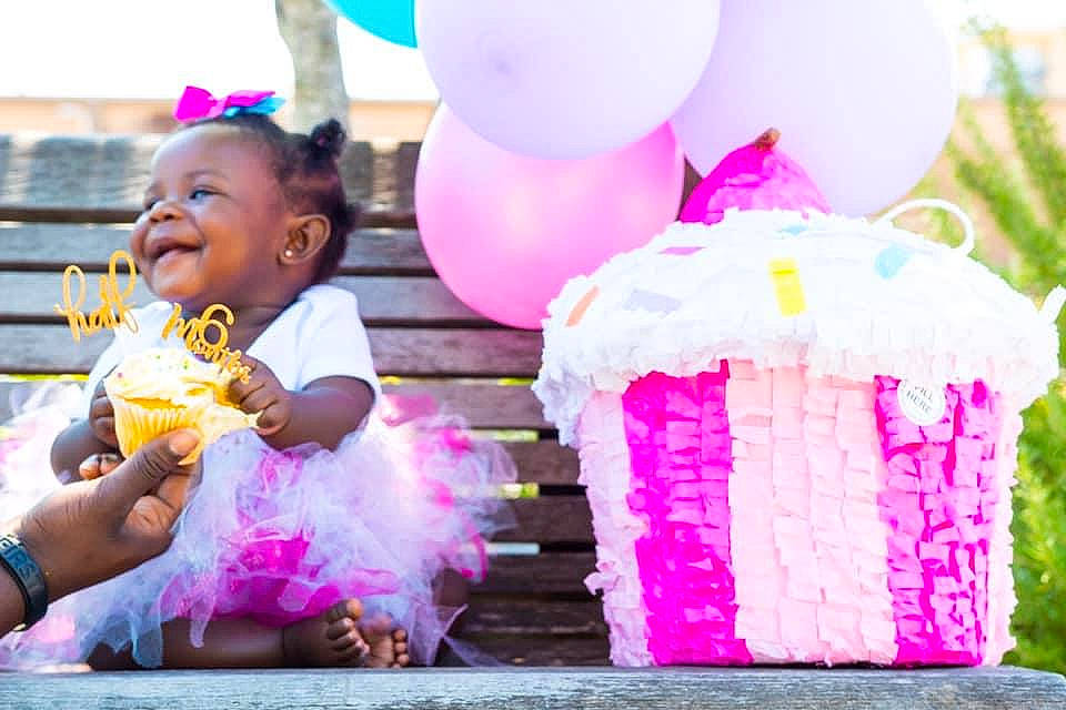 Maleah is registered to the contest to win money with this photo: birthday, child, cotton_candy, dessert, food, happy, party, person, pink, smile, toddler