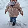child, toddler, pacifier, snow, winter_coat, scarf, boots, jeans, standing, outdoors, footprints, expression_frowning, beanie, jacket, cold_weather, grass_peeking, portrait, baby_face, snowy_ground, small_hands