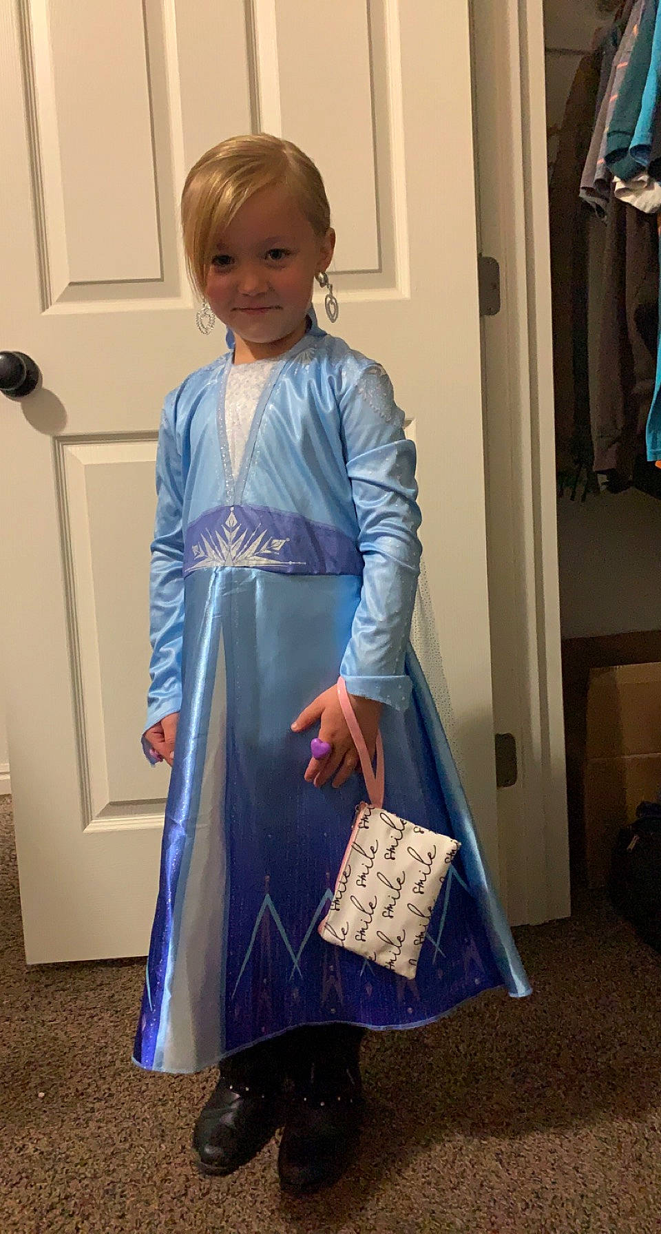 Baylee is registered to the contest to win money with this photo: blue, costume, door, electric_blue, event, fashion_accessory, fashion_design, formal_wear, joint, joy, magenta, one_piece_garment, pattern, person, purple, shoulder, sleeve, smile, standing, street_fashion