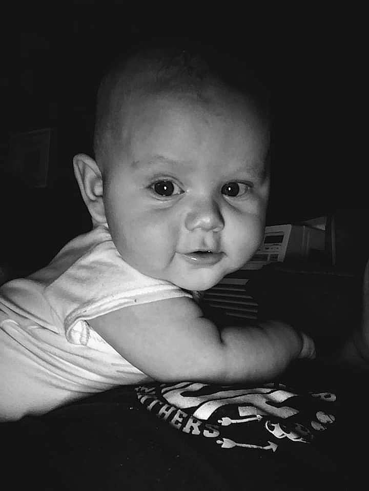 Donovan is registered to the contest to win money with this photo: baby, black, black_and_white, cheek, child, chin, eye, face, head, monochrome, monochrome_photography, nose, organ, people, person, photograph, skin, snapshot, standing, toddler