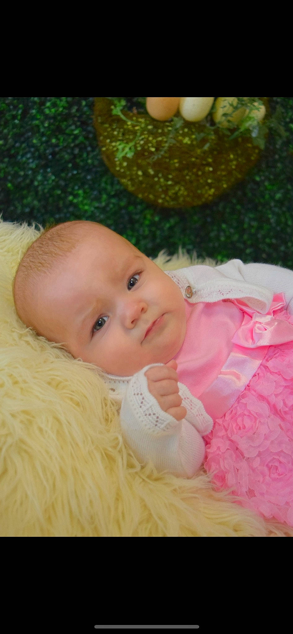 Skylar is registered to the contest to win money with this photo: baby, baby_toddler_clothing, cheek, child, fruit, fun, fur, grass, happy, head, holiday, linens, magenta, pattern, people_in_nature, person, smile, textile, toddler, tree