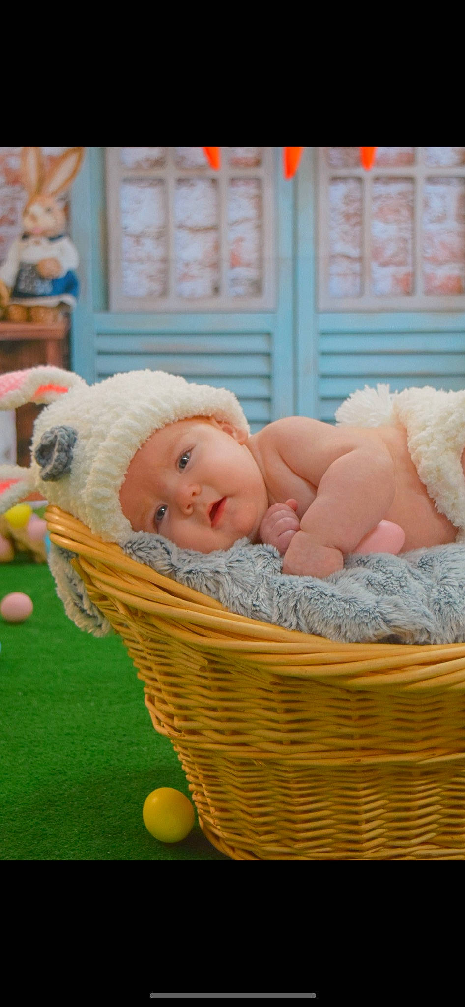 Skylar is registered to the contest to win money with this photo: baby, baby_products, baby_safety, baby_toddler_clothing, basket, child, comfort, event, grass, hat, headwear, infant_bed, leisure, person, room, sitting, storage_basket, summer, toddler, toy