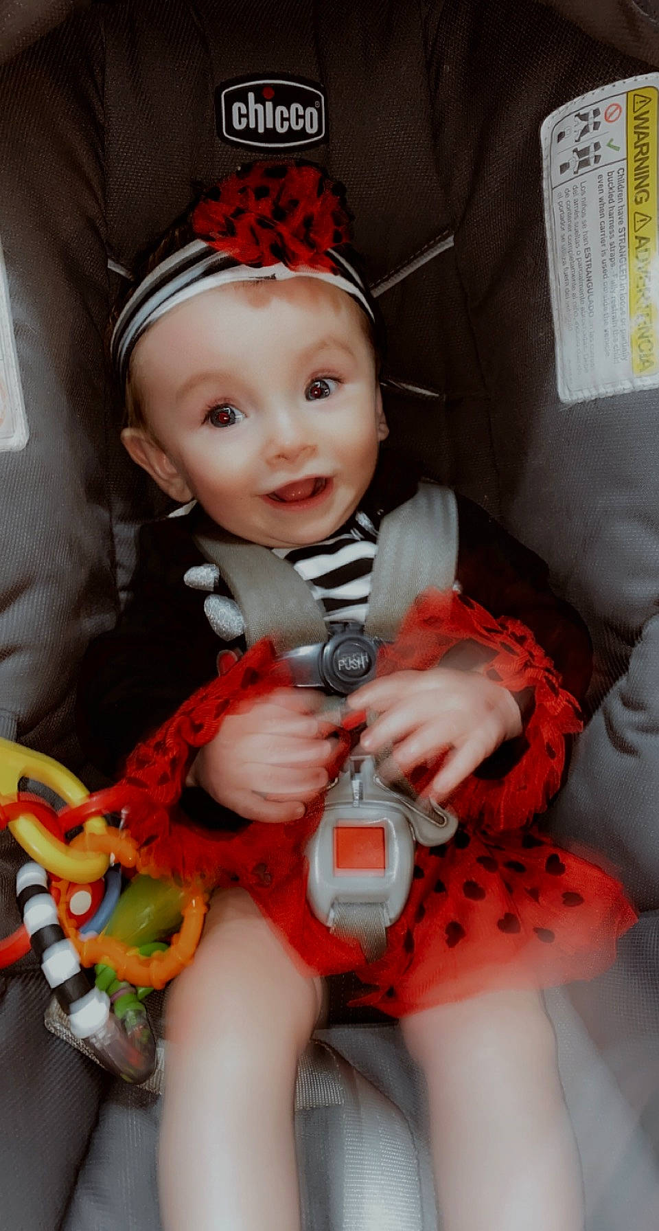 Gracelyn is registered to the contest to win money with this photo: baby, baby_products, baby_toddler_clothing, baby_toys, child, child_model, costume_accessory, finger, hair_accessory, headband, headgear, headpiece, mouth, nail, nose, orange, peach, person, red, toddler