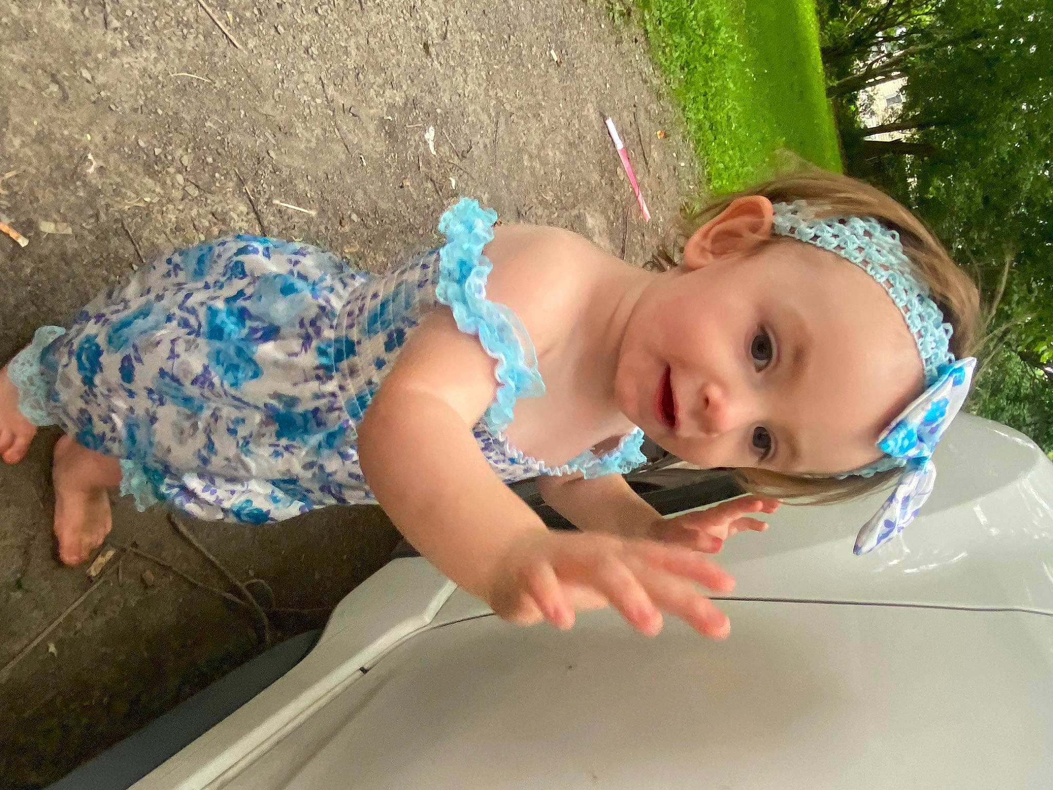 Gracelyn joined the competition — help win amazing prizes! automotive_exterior, baby, child, electric_blue, fashion_accessory, fun, grass, head, headwear, leisure, person, personal_protective_equipment, plant, play, recreation, skin, summer, toddler, tree, vacation