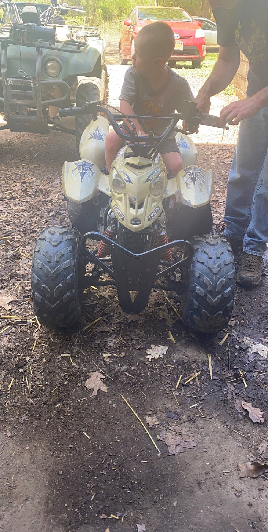 Aiden is registered to the contest to win money with this photo: all_terrain_vehicle, auto_part, automotive_tire, automotive_wheel_system, car, mud, off_road_vehicle, off_roading, person, rim, soil, tire, tread, truggy, vehicle, wheel