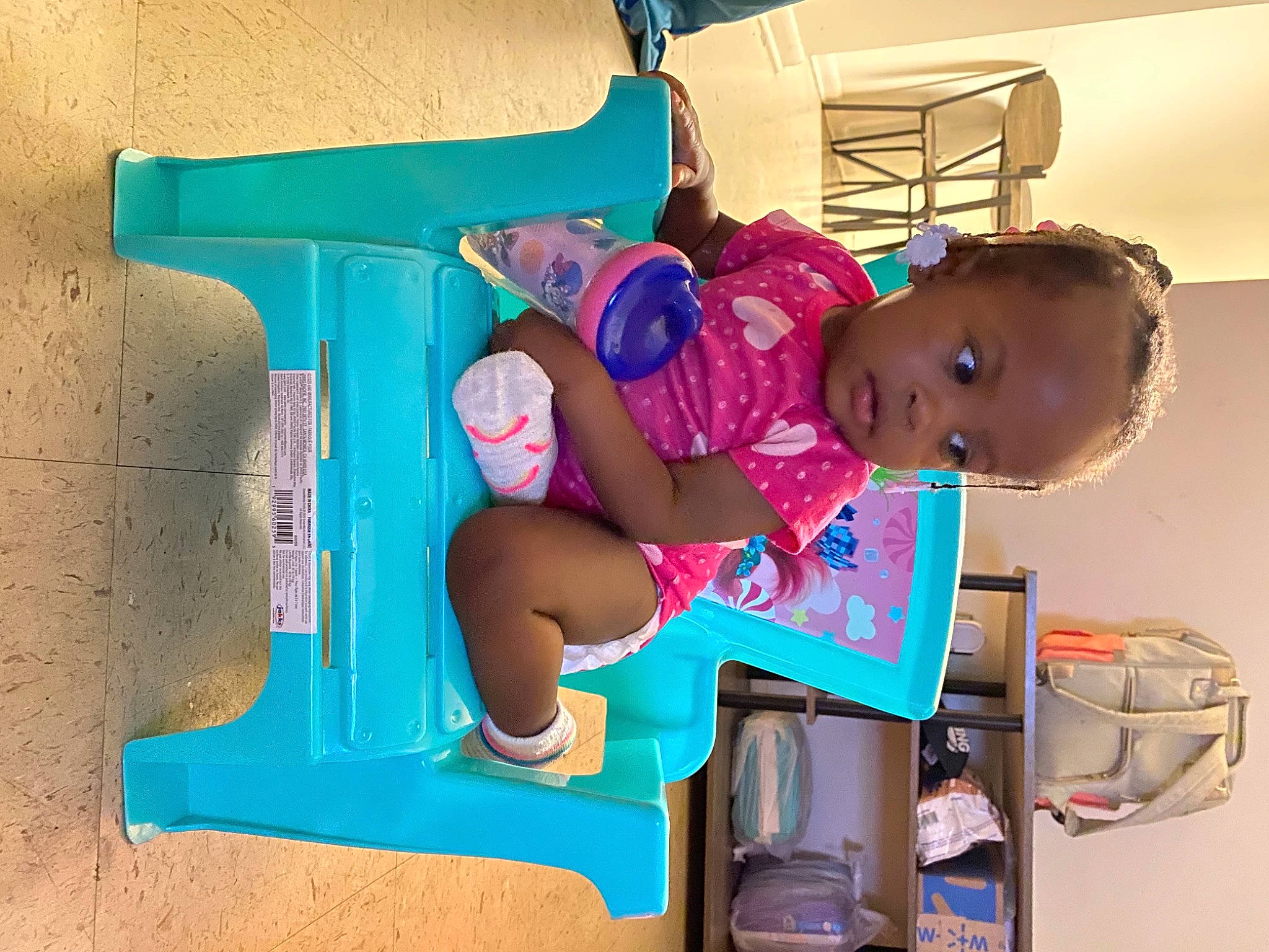Kylee is registered to the contest to win money with this photo: baby, baby_products, baby_toddler_clothing, child, comfort, electric_blue, fun, happy, human_leg, knee, leisure, magenta, person, pink, plastic, play, room, sitting, smile, thigh