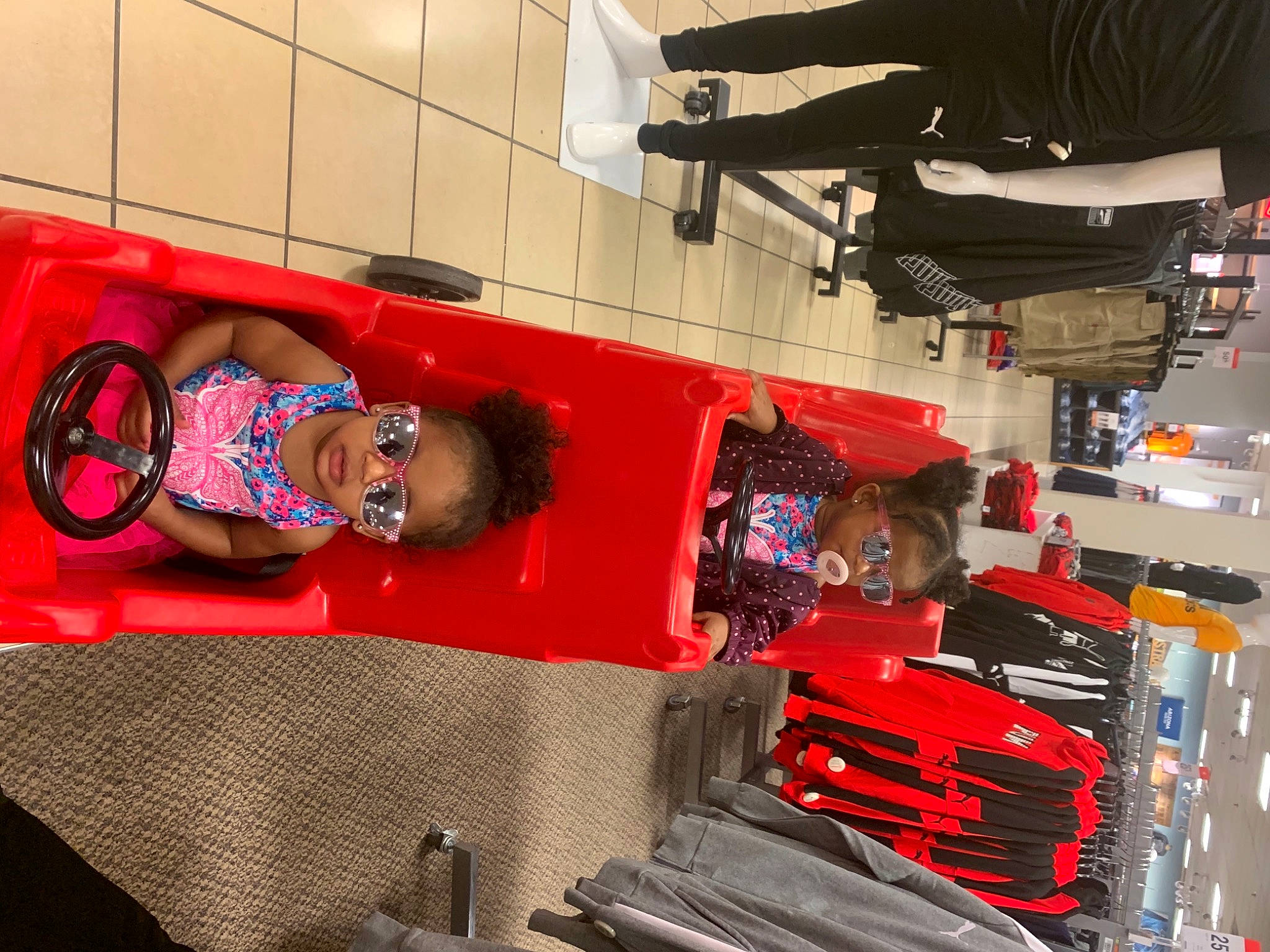 Khloee is registered to the contest to win money with this photo: automotive_design, automotive_tire, engineering, hat, job, luggage_and_bags, machine, person, red, room, t_shirt, tire