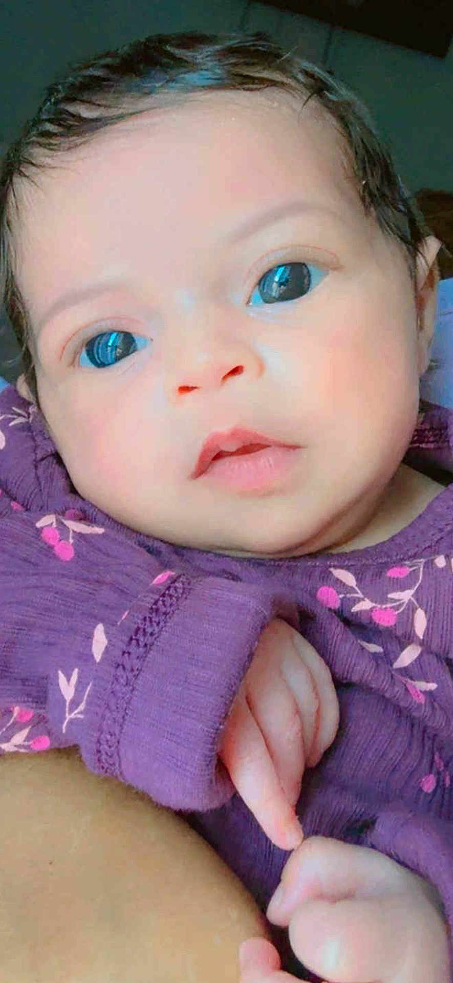 Jucyanne joined the competition — help win amazing prizes! baby, infant, face, eyes, hand, purple_clothing, floral_pattern, skin, portrait, cute, child, newborn, closeup, human, person, soft_lighting, indoors, expression, young, toddler