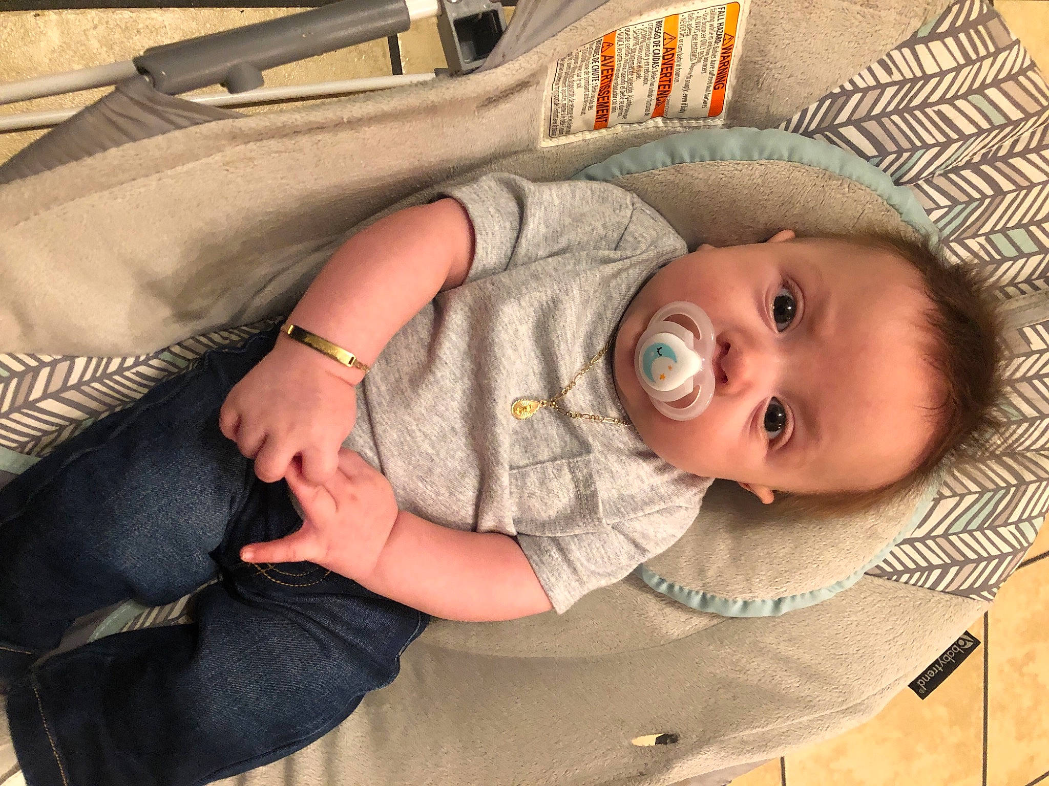 Mateo joined the competition — help win amazing prizes! baby, baby_toddler_clothing, bag, cheek, child, comfort, couch, eye, facial_expression, finger, hat, human_body, luggage_and_bags, mammal, mouth, nose, outerwear, person, skin, toddler