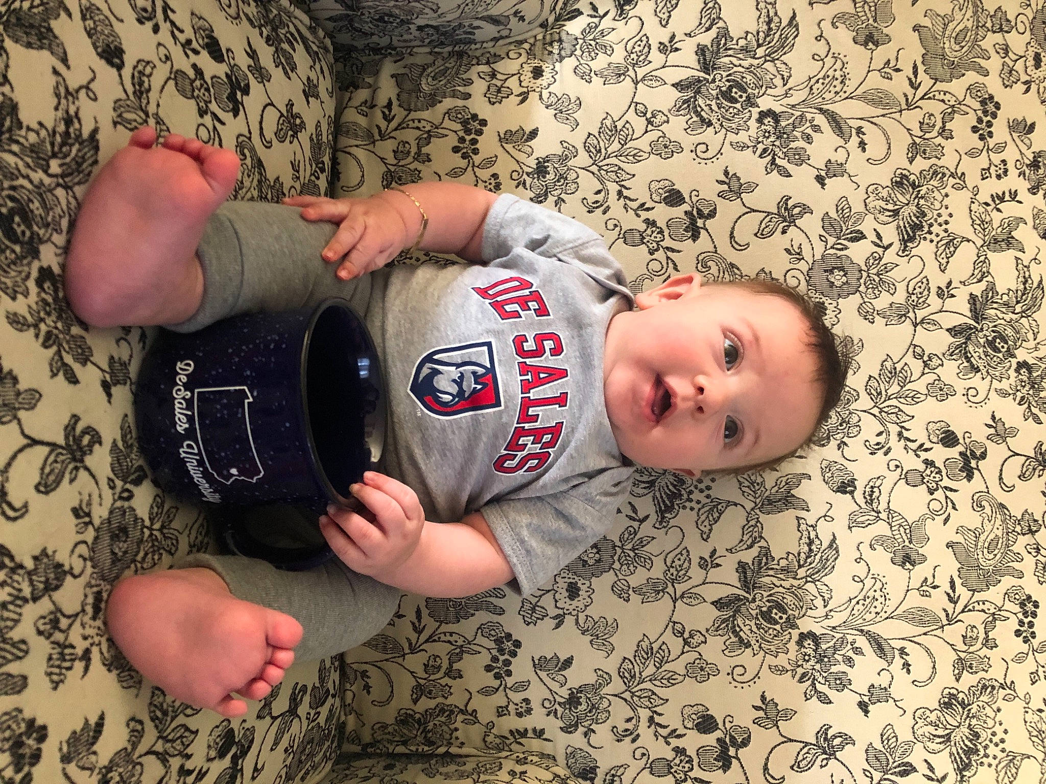 Mateo joined the competition — help win amazing prizes! baby_toddler_clothing, comfort, elbow, finger, flash_photography, flooring, gesture, happy, human, human_body, joint, leg, mammal, person, sleeve, t_shirt, thigh, toddler, trunk, vertebrate