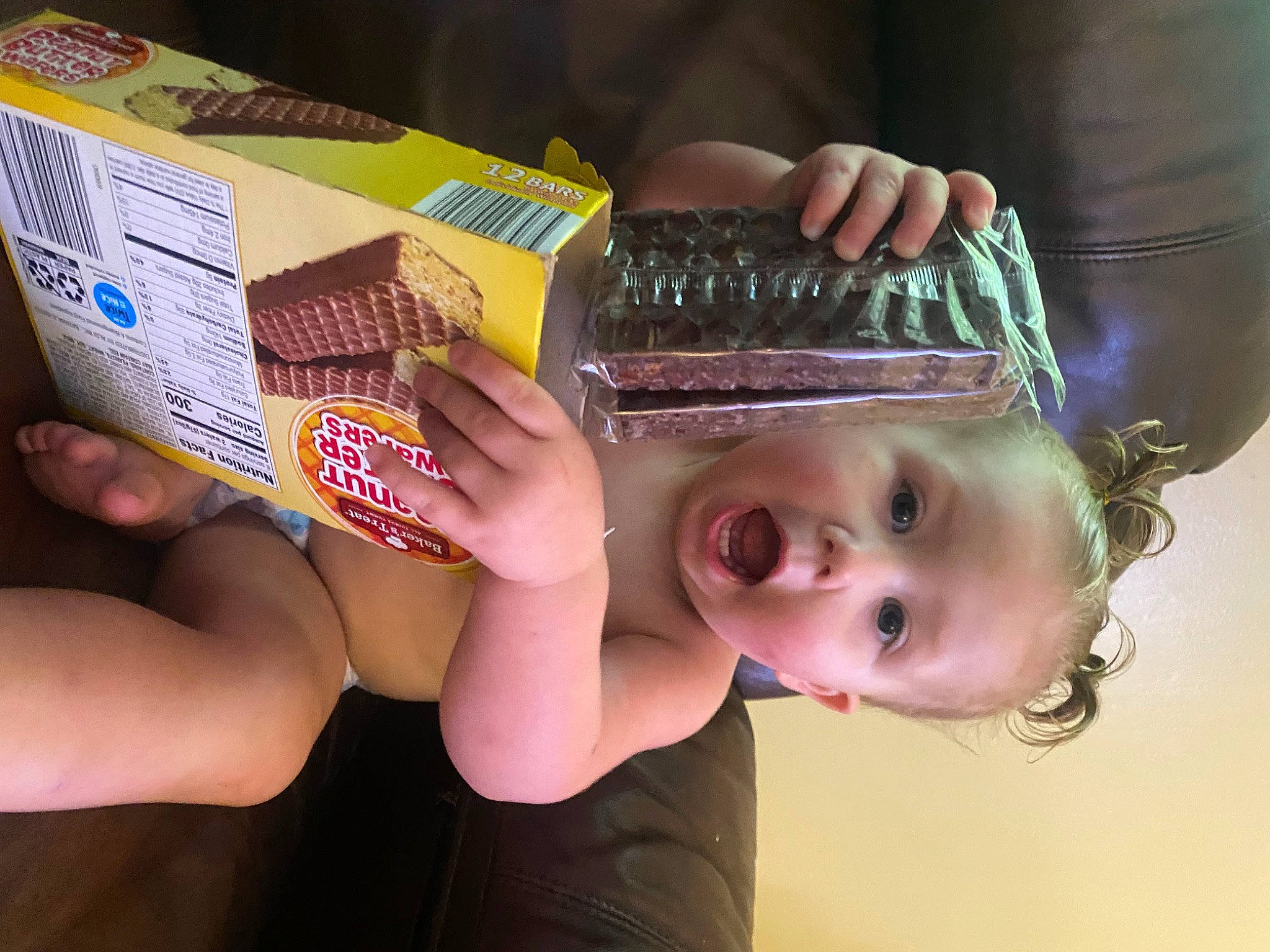 Mairee Grace Yarnevich is registered to the contest to win money with this photo: bracelet, child, costume_hat, eyelash, fashion_accessory, finger, finger_food, fun, hand, happy, hat, headpiece, human, jewellery, junk_food, nail, person, personal_protective_equipment, surprise, sweetness