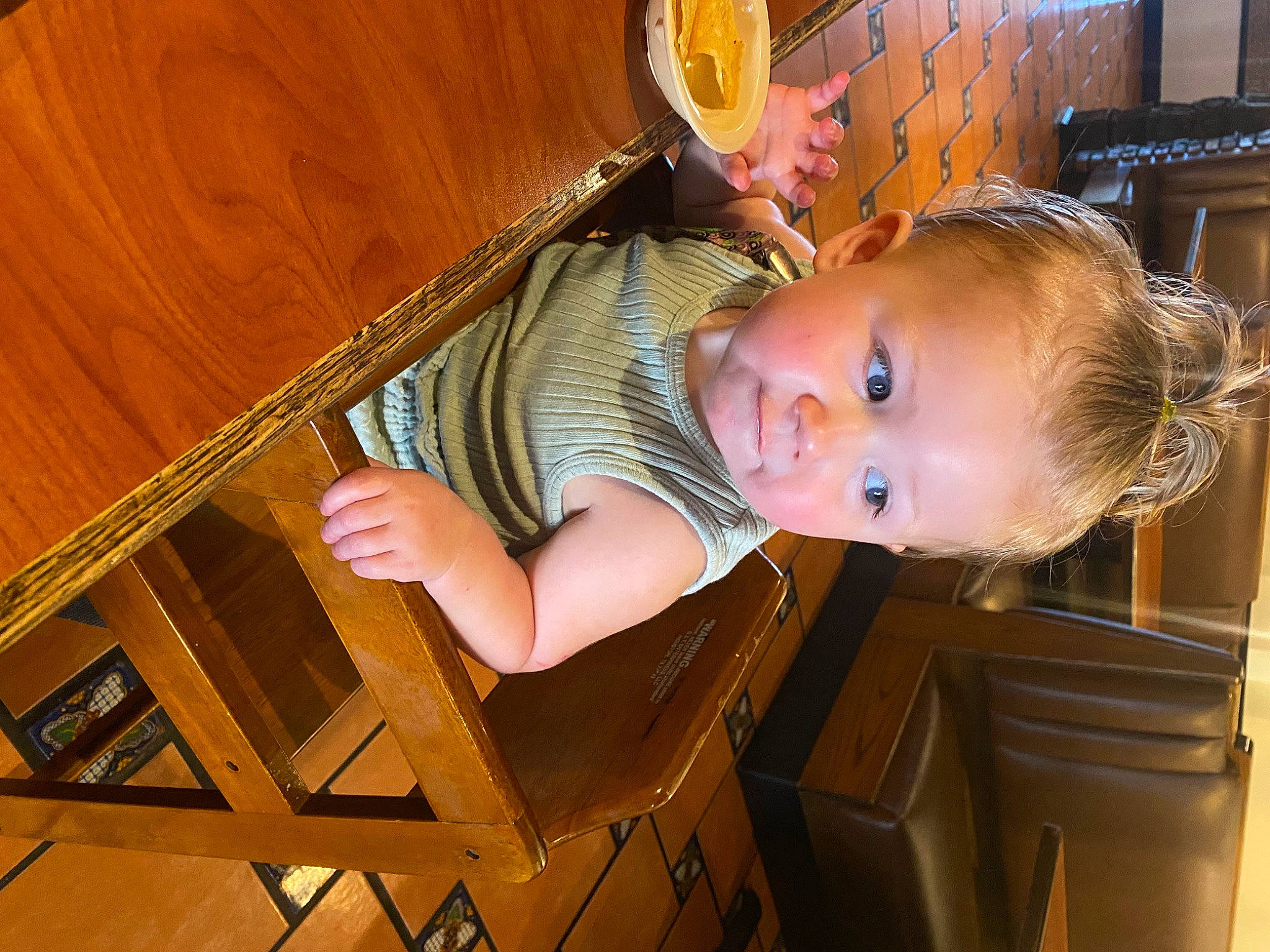 Mairee Grace Yarnevich is registered to the contest to win money with this photo: baby, baby_products, baby_safety, baby_toddler_clothing, chair, child, comfort, fun, hardwood, hat, pattern, person, room, sitting, smile, sunglasses, toddler, varnish, wood