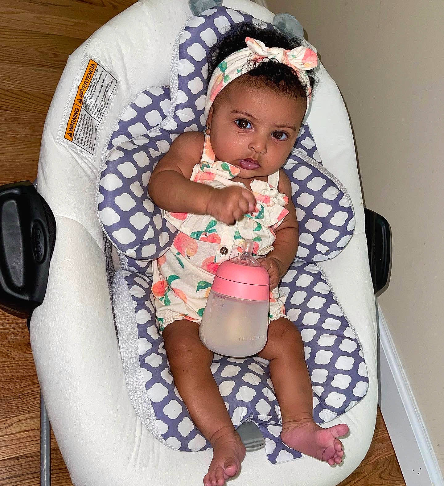 Royal is registered to the contest to win money with this photo: baby, baby_products, baby_sleeping, baby_toddler_clothing, bag, car_seat, child, comfort, event, fashion_accessory, human_leg, knee, lap, pattern, person, personal_protective_equipment, play, sitting, sleeve, thigh