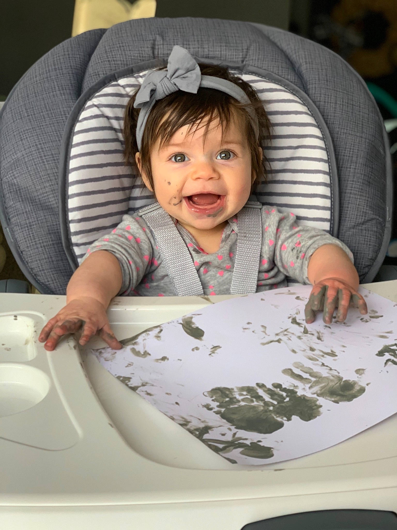Adelaide is registered to the contest to win money with this photo: arm, baby, baby_toddler_clothing, cheek, child, comfort, dishware, eye, face, facial_expression, fun, hairstyle, happy, people, person, plate, product, sleeve, smile, t_shirt
