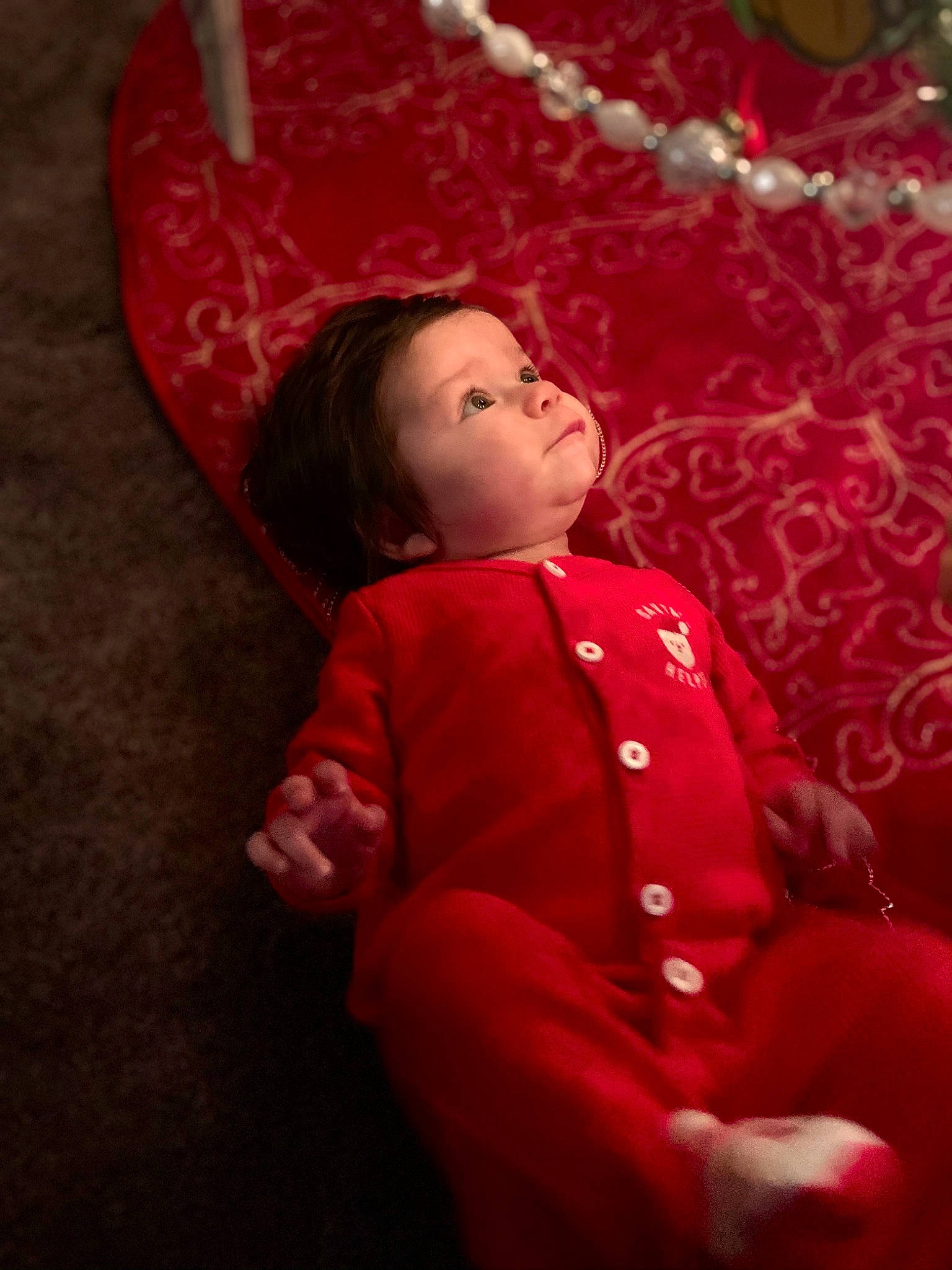 Adelaide is registered to the contest to win money with this photo: baby, baby_toddler_clothing, carmine, cheek, child, christmas, event, flooring, fun, happy, holiday, magenta, pattern, people, person, pink, room, sleeve, toddler, tree