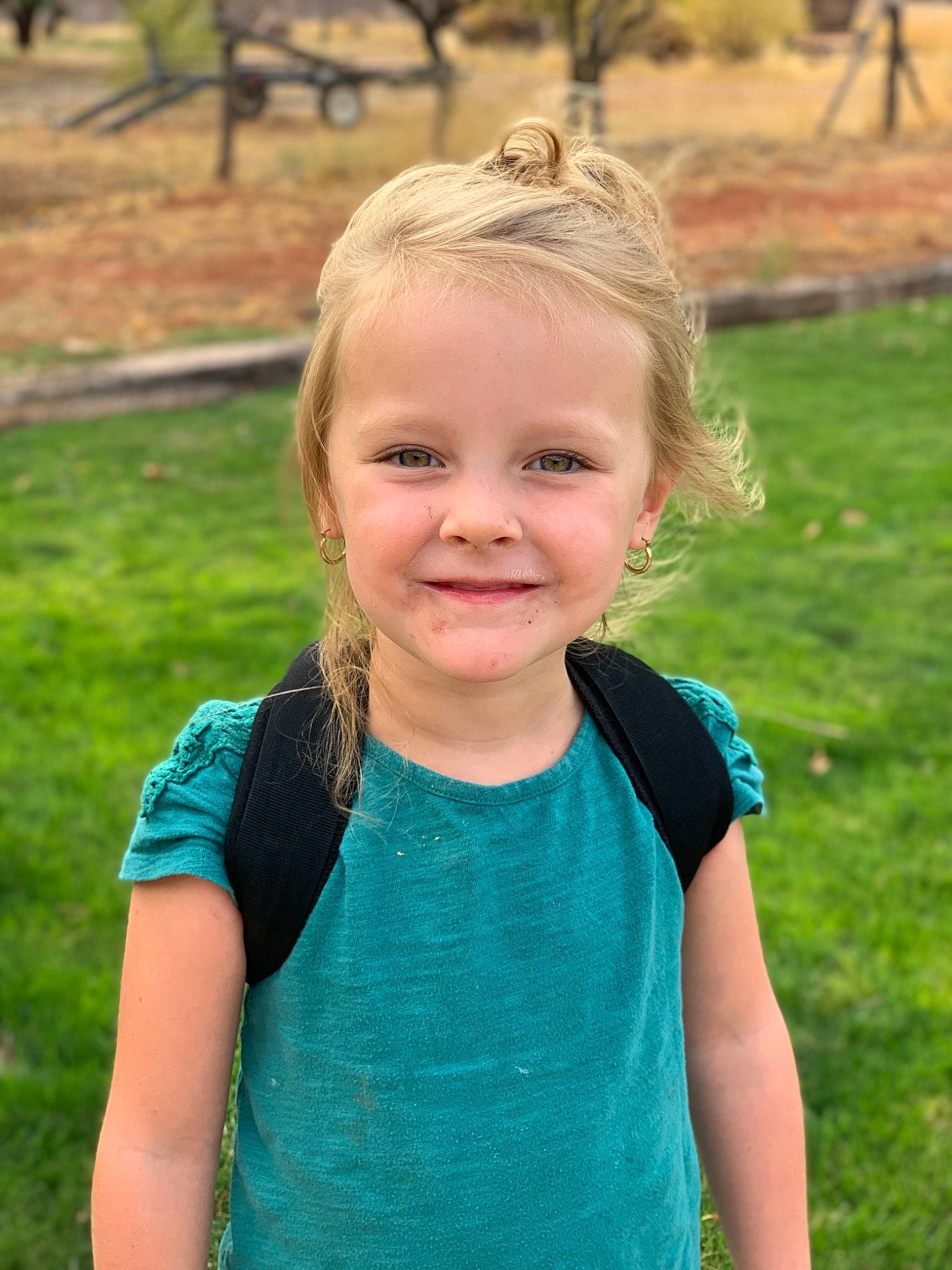 Alexis is registered to the contest to win money with this photo: blond, child, child_model, face, fun, grass, green, hair, hairstyle, happy, head, joy, neck, people, person, photography, plant, smile, summer, toddler