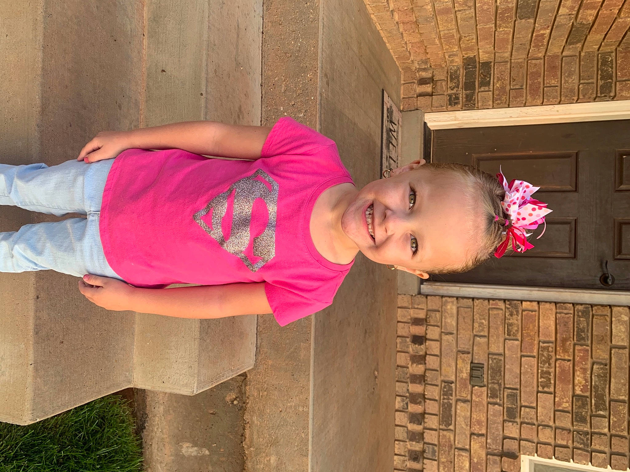 Alexis is registered to the contest to win money with this photo: child, happy, house, joy, leg, person, pink, t_shirt, toddler, vacation