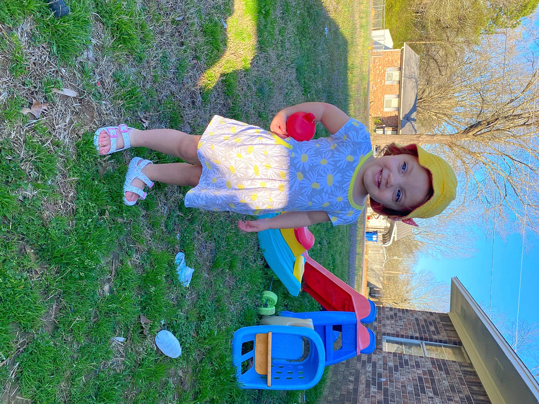Sophie is registered to the contest to win money with this photo: baby, baby_toddler_clothing, child, city, electric_blue, fun, grass, grassland, happy, headwear, joy, leisure, people_in_nature, person, plant, play, recreation, sky, smile, toddler