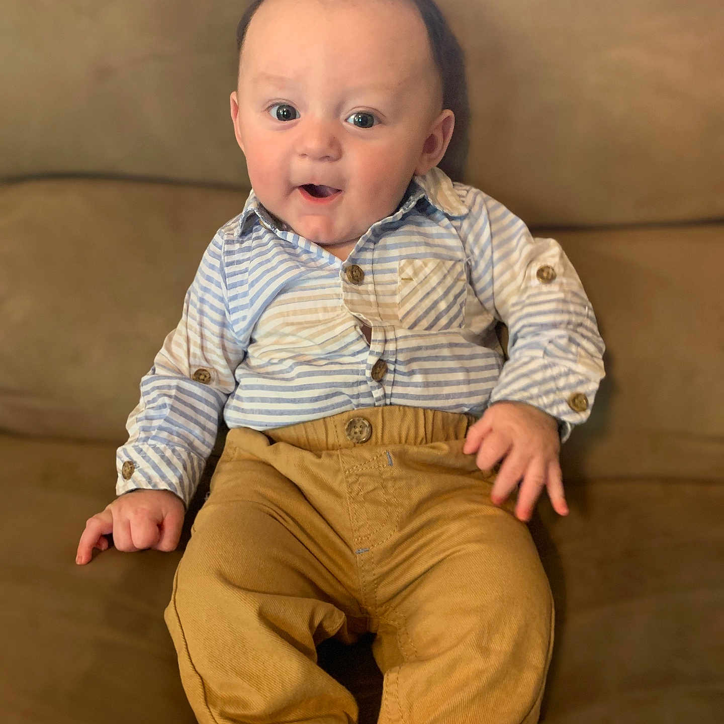 Ethan joined the competition — help win amazing prizes! baby, babylaughing, bodypart, clothing, couch, face, finger, furniture, happy, head, jeans, pants, person, photography, portrait, shirt, sitting, sleeve, smile, yawning