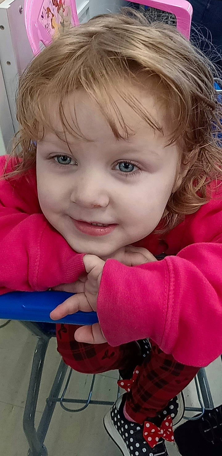 Leah is registered to the contest to win money with this photo: baby_toddler_clothing, cheek, chin, eye, eyelash, face, facial_expression, gesture, hair, hairstyle, happy, human_body, iris, joy, lip, mouth, nose, person, pink, skin