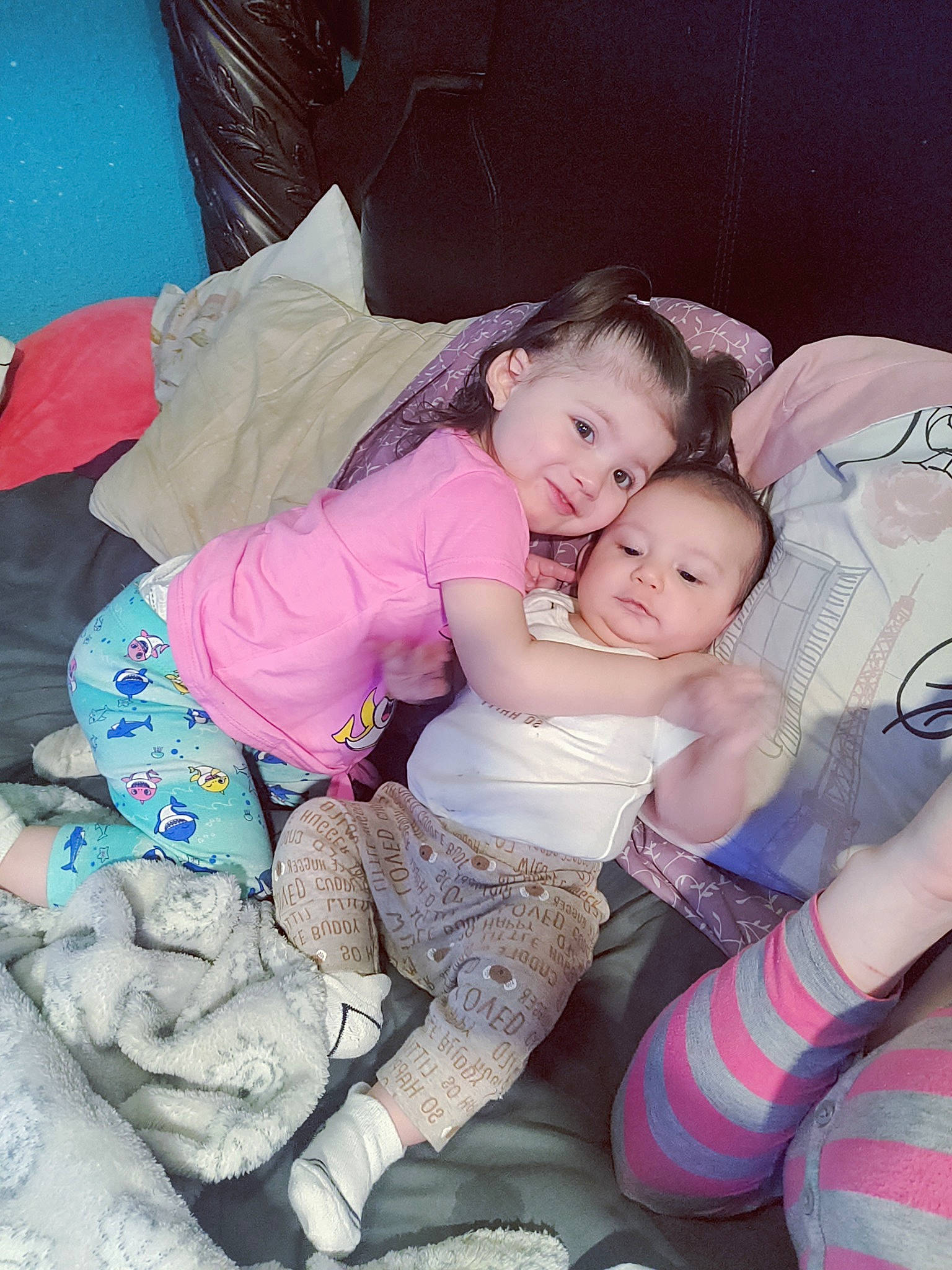 Amanda is registered to the contest to win money with this photo: arm, baby_toddler_clothing, comfort, cool, eye, face, finger, hairstyle, happy, head, human, joy, lap, leg, person, pink, product, purple, skin, smile