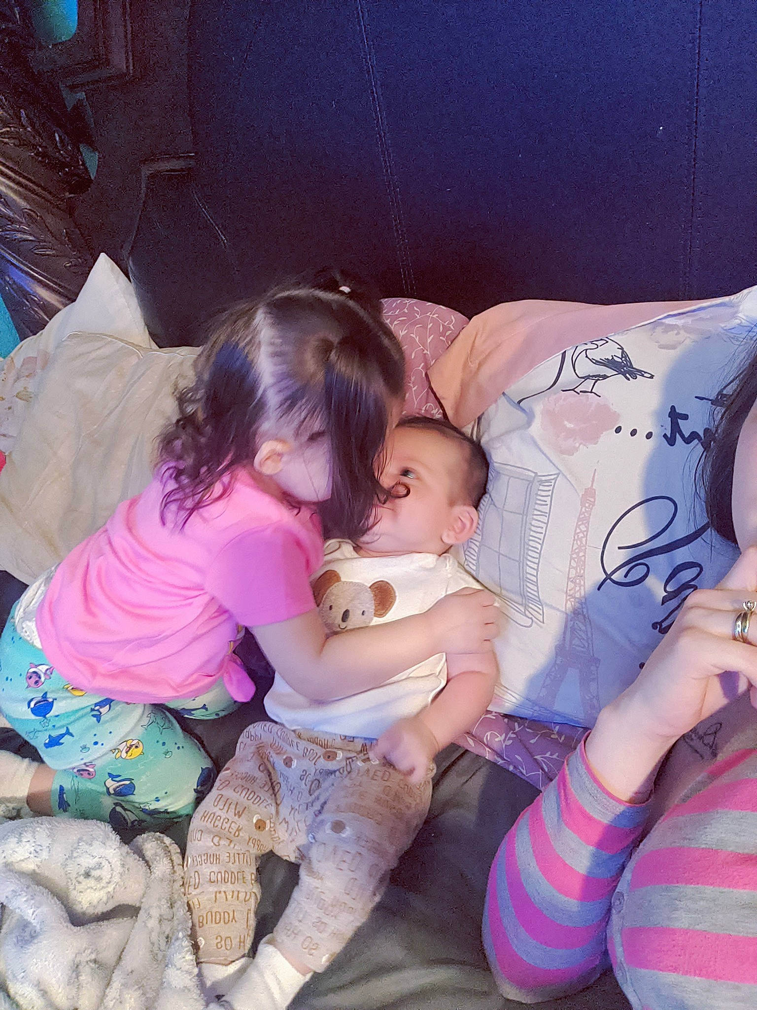 Amanda is registered to the contest to win money with this photo: abdomen, arm, baby, comfort, couch, eye, finger, fun, hand, happy, head, lap, leg, mouth, person, pink, purple, skin, thigh, toddler