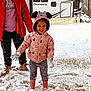 Kya is registered to the contest to win money with this photo: child, snow, winter, play, pink_jacket, hoodie, gloves, boots, adult, outdoor, grass, trailer, smile, happy, snowball, patterned_pants, red_jacket, cold, fun, family