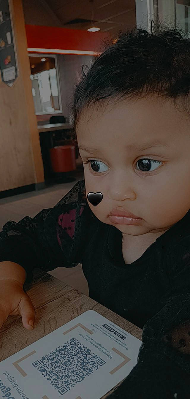 Allya participe au concours pour gagner de l'argent avec cette photo : baby, baby_toddler_clothing, cheek, child, ear, eyelash, finger, flooring, forehead, fun, hand, iris, lip, mouth, nose, person, t_shirt, thumb, toddler, wood