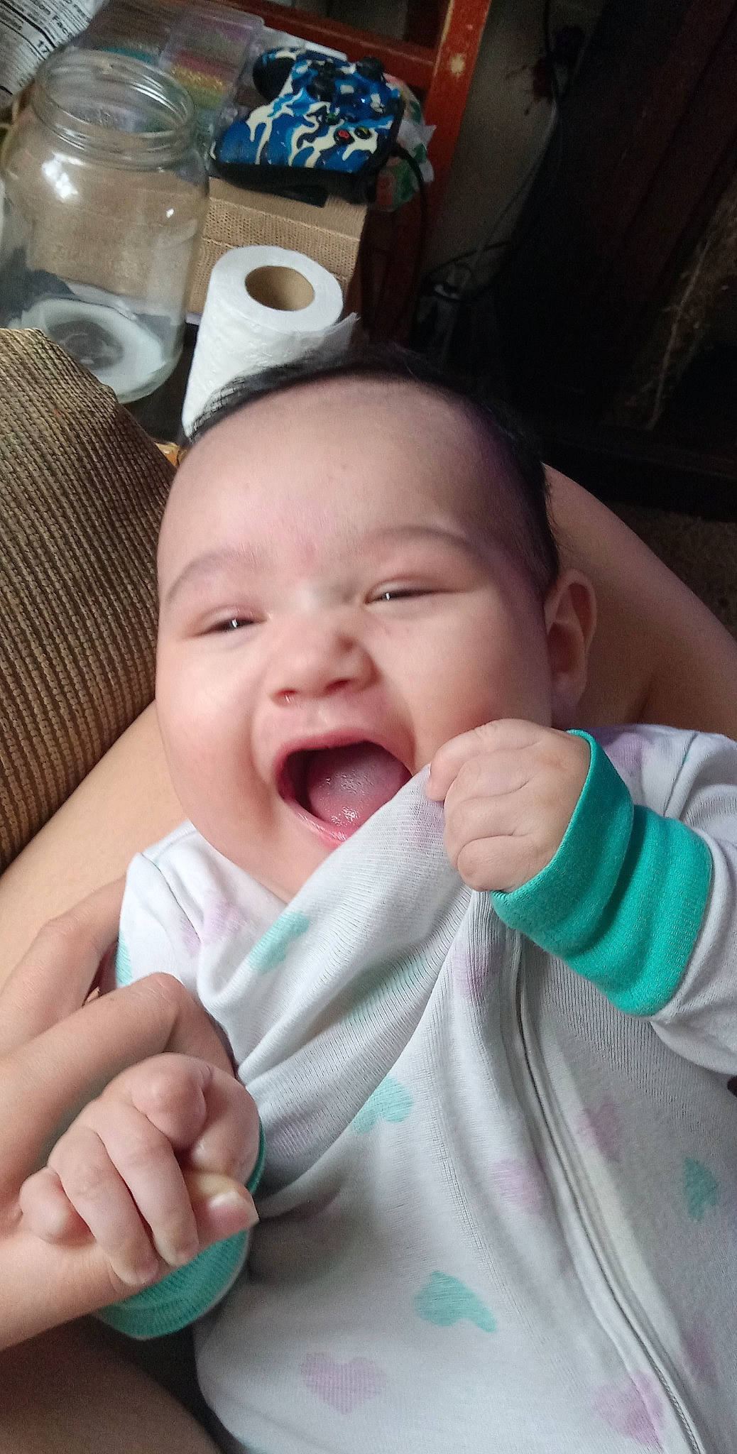 Joanna is registered to the contest to win money with this photo: baby, baby_toddler_clothing, cheek, comfort, eyebrow, face, finger, gesture, hand, happy, head, lip, mouth, nail, nose, person, skin, smile, thumb, toddler