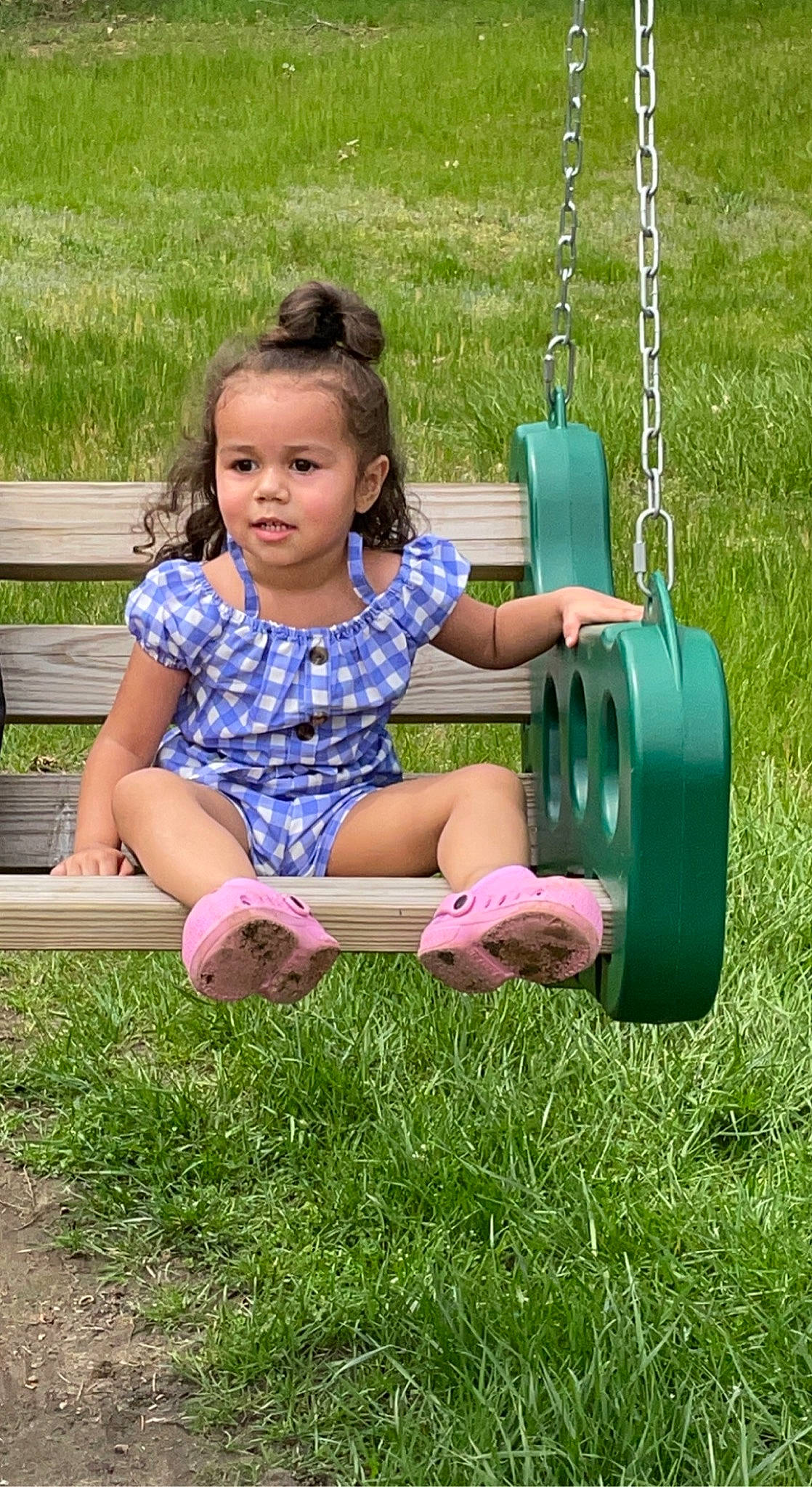 Kehlani is registered to the contest to win money with this photo: baby_toddler_clothing, child, city, fun, grass, grassland, green, happy, lawn, leisure, outdoor_play_equipment, people_in_nature, person, plant, playground, public_space, recreation, swing, toddler, tree