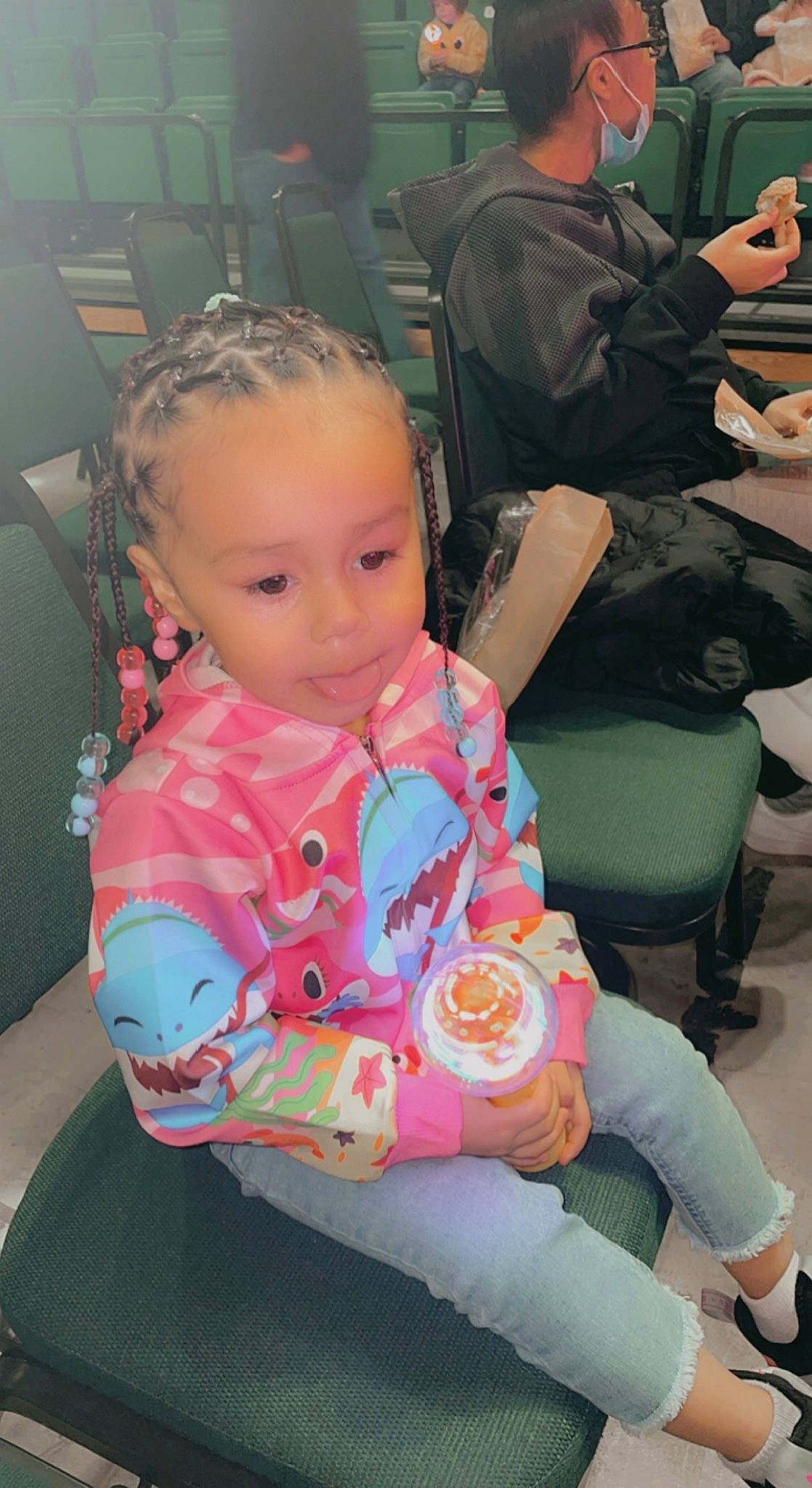Kehlani joined the competition — help win amazing prizes! arm, baby, baby_toddler_clothing, chair, cheek, child, event, finger, fun, hairstyle, hand, human, iris, joint, lap, mouth, person, pink, sitting, skin