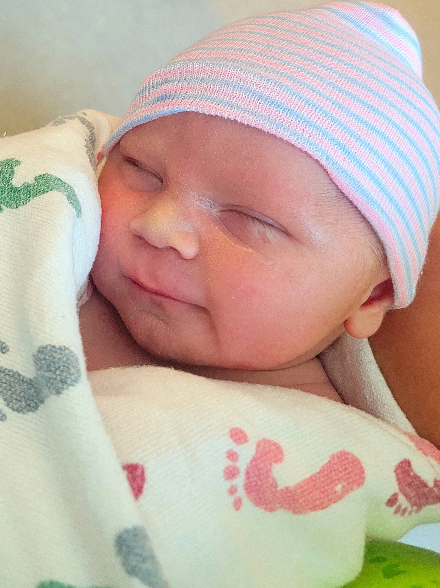 Giovanni is registered to the contest to win money with this photo: baby, baby_sleeping, baby_toddler_clothing, cheek, chin, comfort, eyebrow, face, facial_expression, finger, head, headwear, lip, mouth, nose, person, pink, product, skin, textile