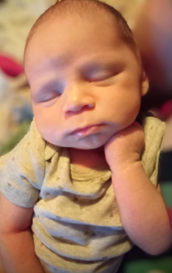 Giovanni is registered to the contest to win money with this photo: arm, baby, baby_toddler_clothing, cheek, child, ear, eyelash, finger, fun, gesture, happy, iris, lip, mouth, neck, nose, person, skin, sleeve, thumb