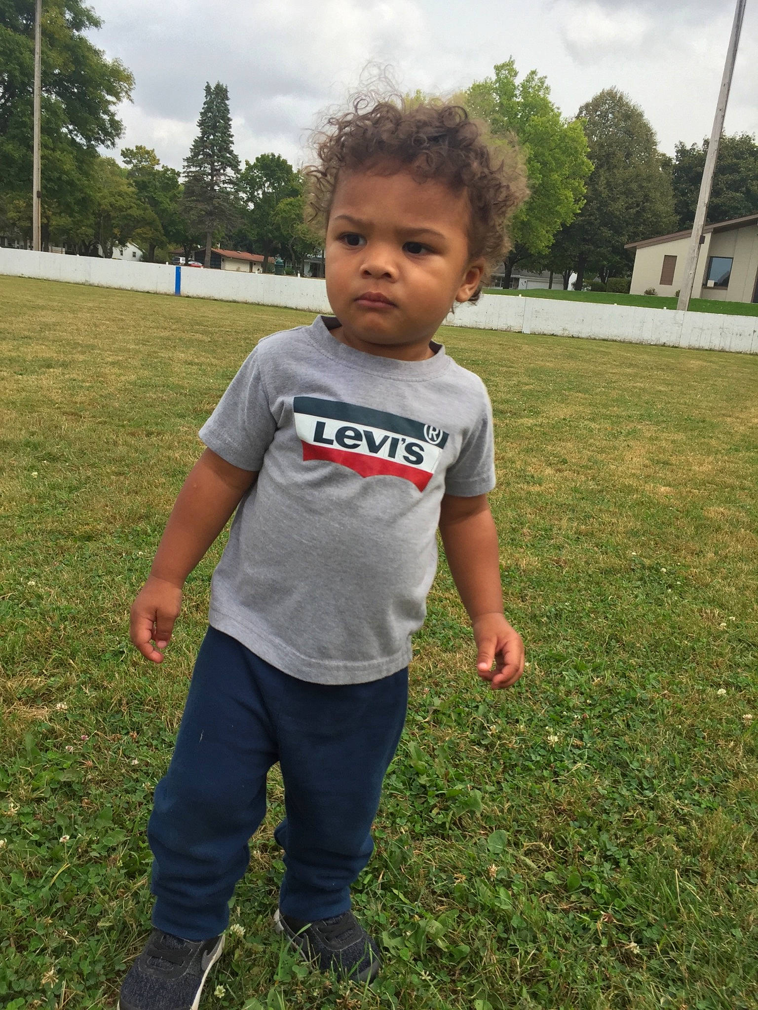 Kj is registered to the contest to win money with this photo: child, cool, fun, grass, lawn, person, plant, recreation, smile, summer, t_shirt, toddler, tree, vacation