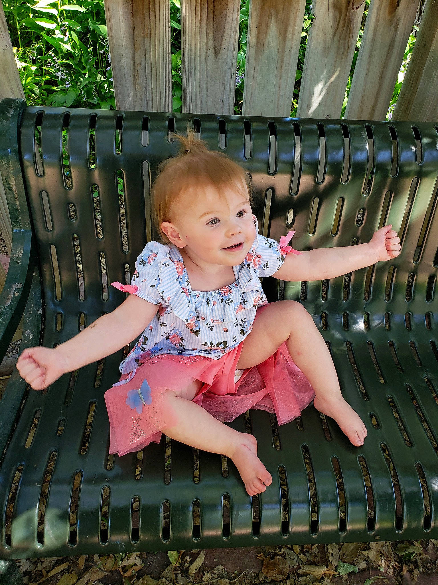 Alicyn is registered to the contest to win money with this photo: baby, baby_toddler_clothing, barefoot, child, daughter, dress, furniture, grass, person, pink, sitting, skin, spring, toddler