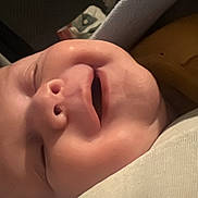 Isaac joined the competition — help win amazing prizes! baby, blanket, chubby_cheeks, close_up, clothing, cozy, cute, face, head, indoors, infant, mouth_open, peaceful, person, portrait, rest, skin, sleeping, soft, young_child