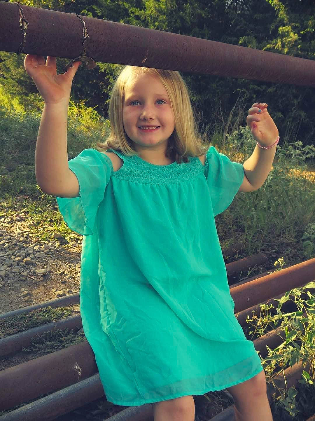 Sophia joined the competition — help win amazing prizes! cool, day_dress, facial_expression, finger, flash_photography, gesture, grass, hair, happy, joy, leisure, neck, one_piece_garment, people_in_nature, person, plant, shoulder, sleeve, smile, t_shirt