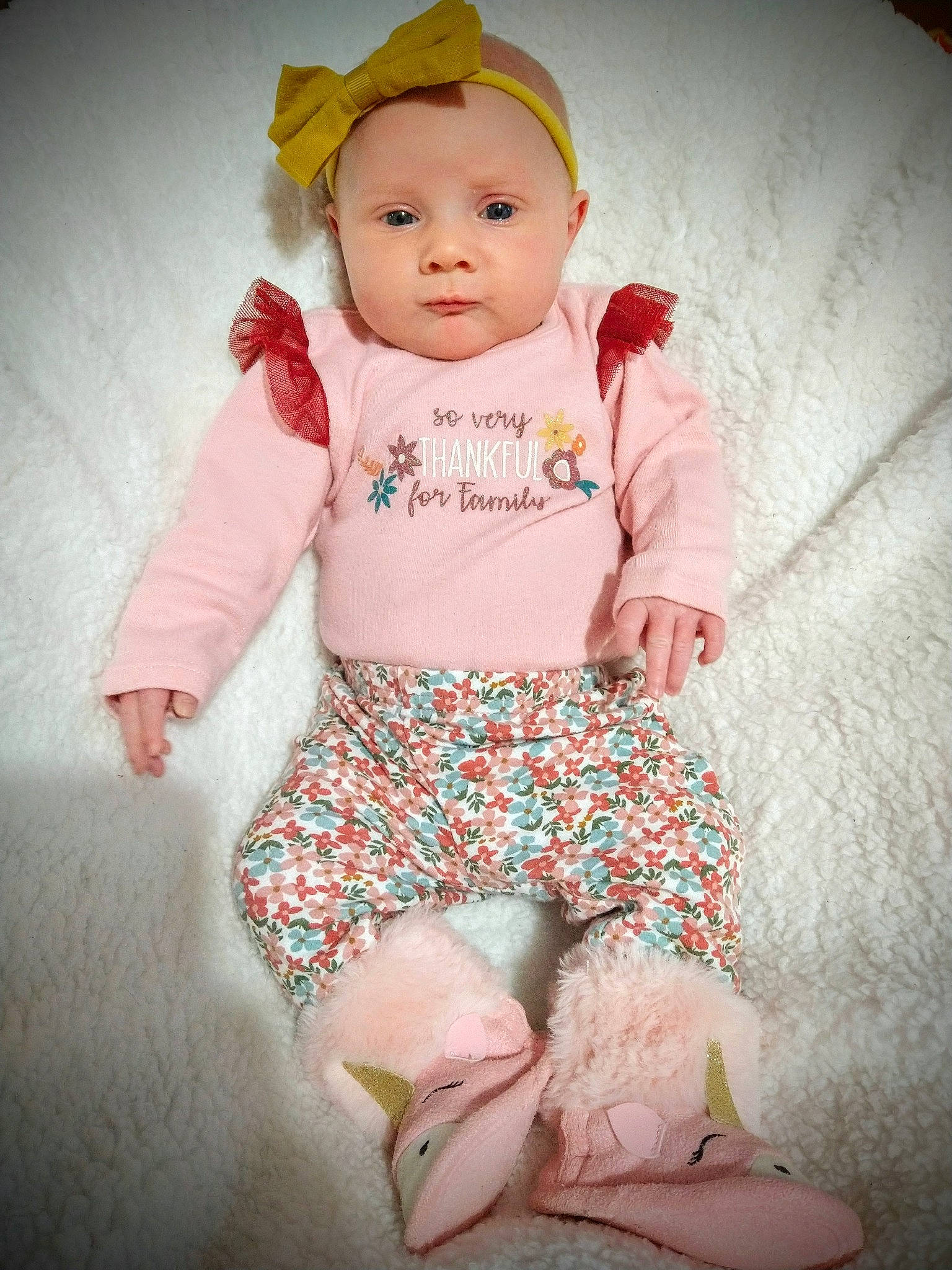 Diana is registered to the contest to win money with this photo: arm, baby, baby_toddler_clothing, cheek, eye, face, hand, happy, head, headwear, human_body, knee, leg, neck, person, pink, skin, sleeve, t_shirt, textile