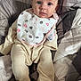 Lily joined the competition — help win amazing prizes! animal_print, baby, bed, bib, blanket, child, clothing, comfort, cute, expression, face, indoors, infant, newborn, pajamas, person, portrait, quilt, sleepwear, soft