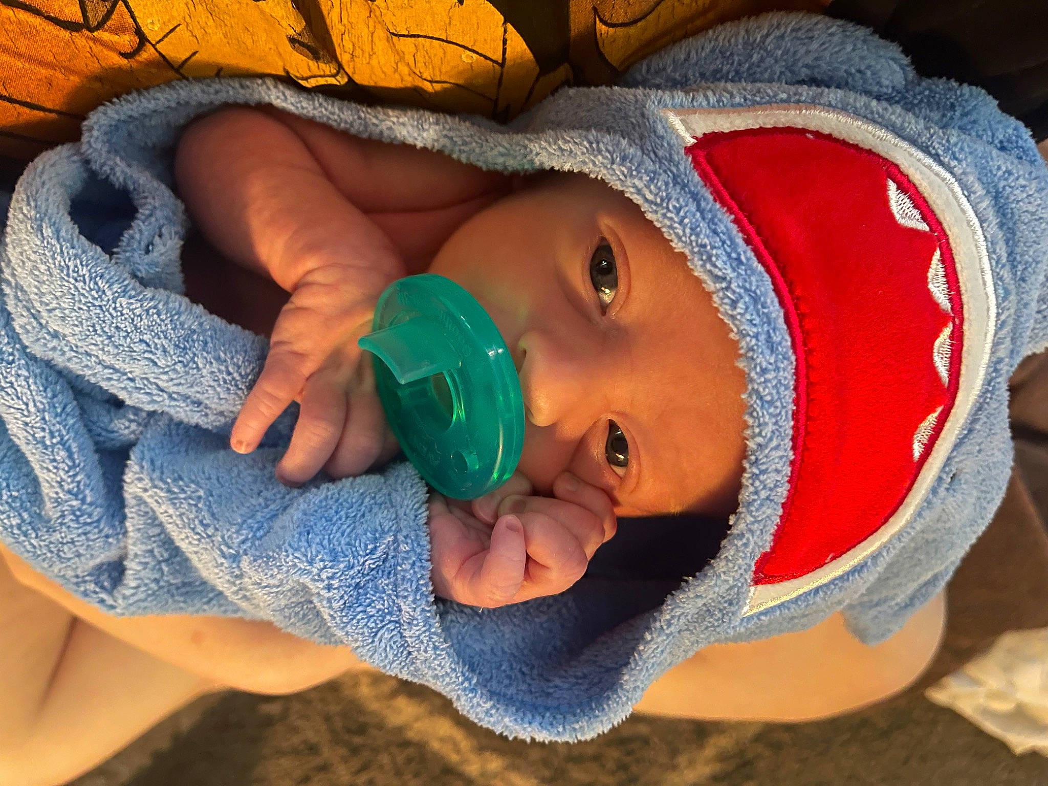 Kian joined the competition — help win amazing prizes! baby, baby_products, baby_toddler_clothing, cap, cheek, child, comfort, drinkware, eyelash, facial_expression, finger, headwear, human_body, iris, lip, mouth, nail, nose, person, plastic_bottle