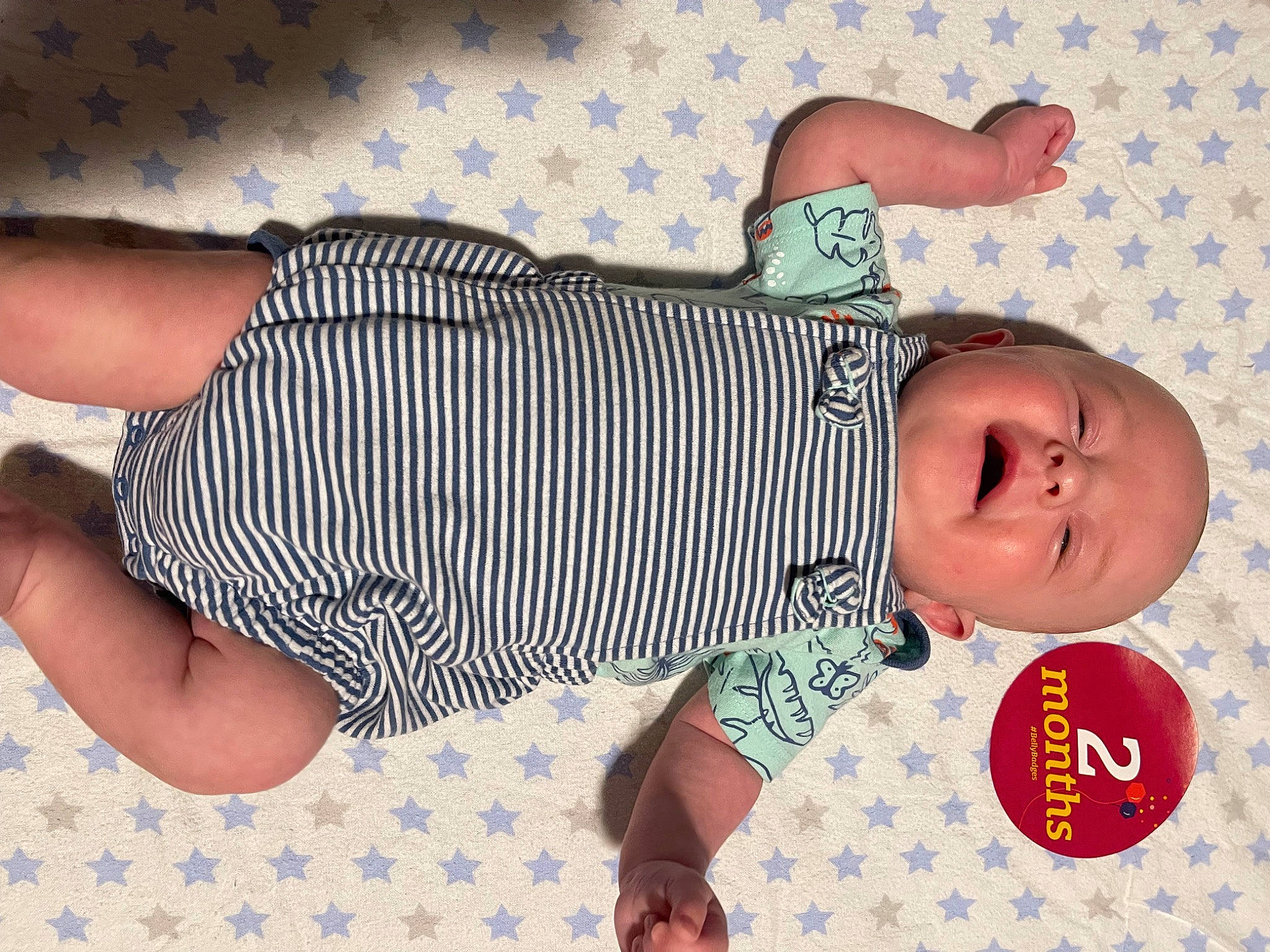 Kian joined the competition — help win amazing prizes! baby, baby_products, baby_sleeping, baby_toddler_clothing, child, comfort, happy, linens, pattern, person, sleeve, textile, toddler, white, wrist